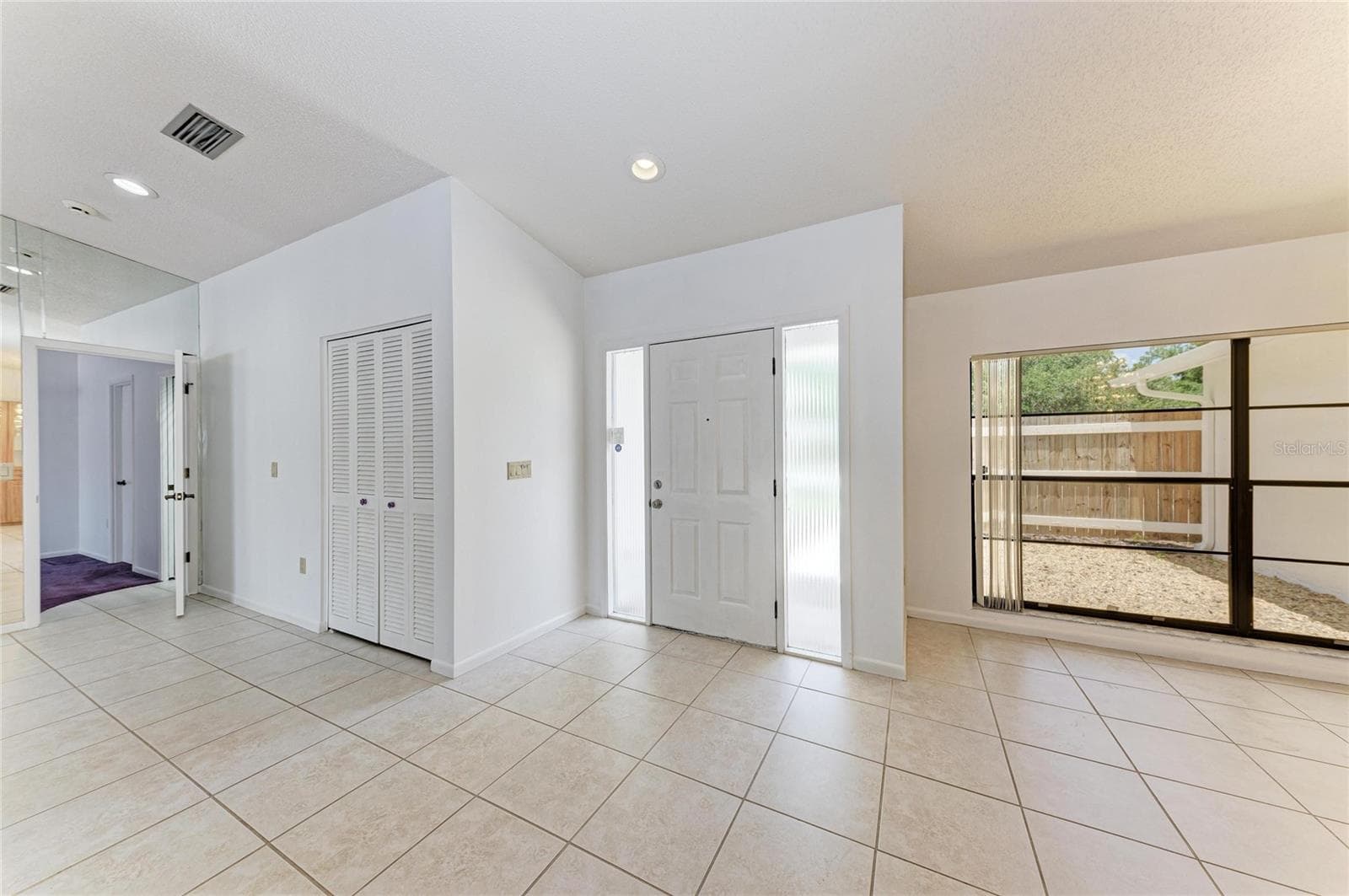 living room and formal dining - 4242 DRYDEN CIR, SARASOTA