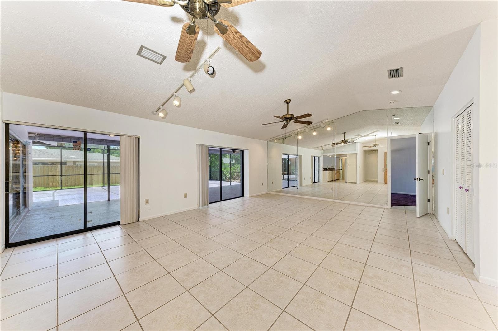 living room and formal dining - 4242 DRYDEN CIR, SARASOTA