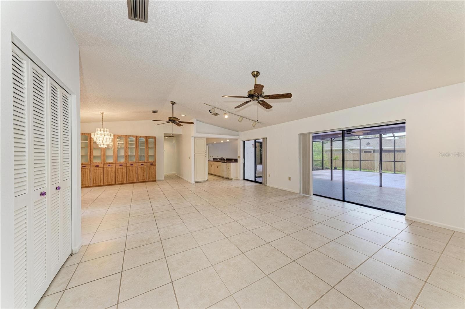 living room and formal dining - 4242 DRYDEN CIR, SARASOTA