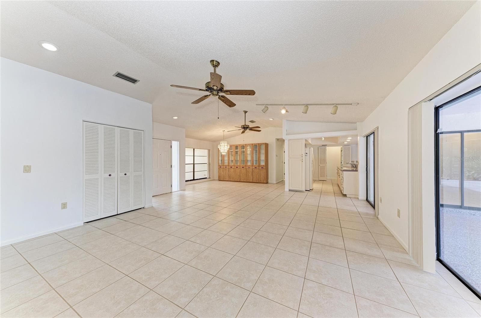 living room and formal dining - 4242 DRYDEN CIR, SARASOTA