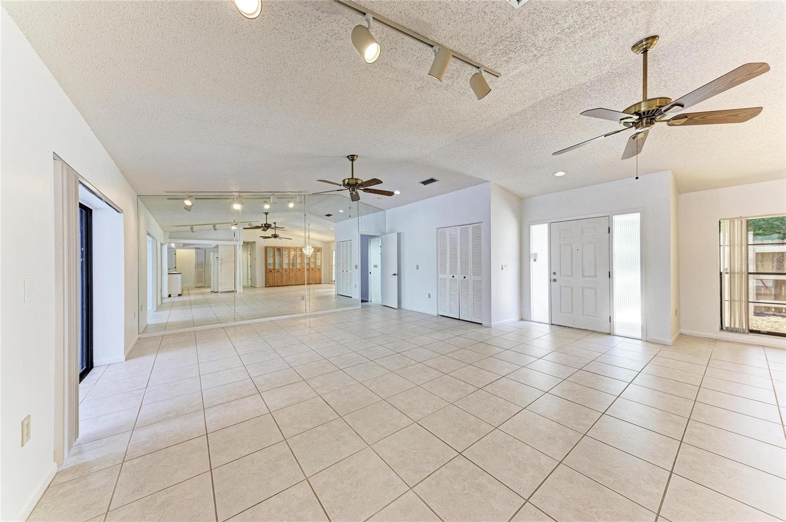 living room and formal dining - 4242 DRYDEN CIR, SARASOTA