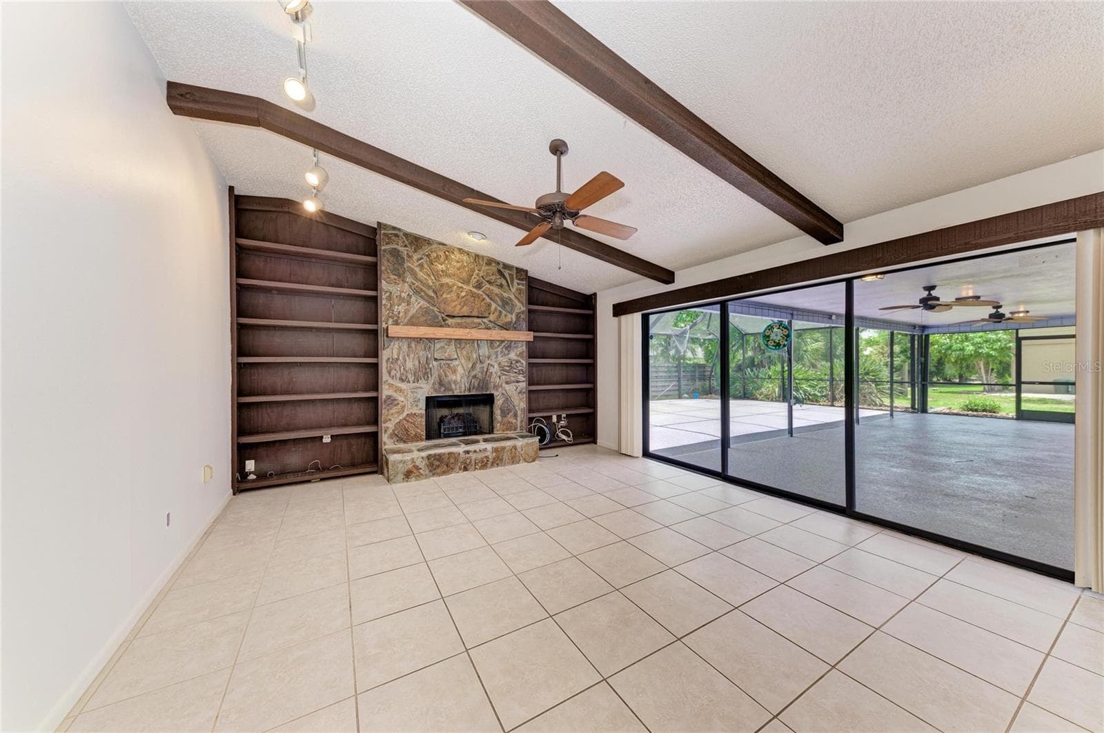 Family room with fireplace - 4242 DRYDEN CIR, SARASOTA