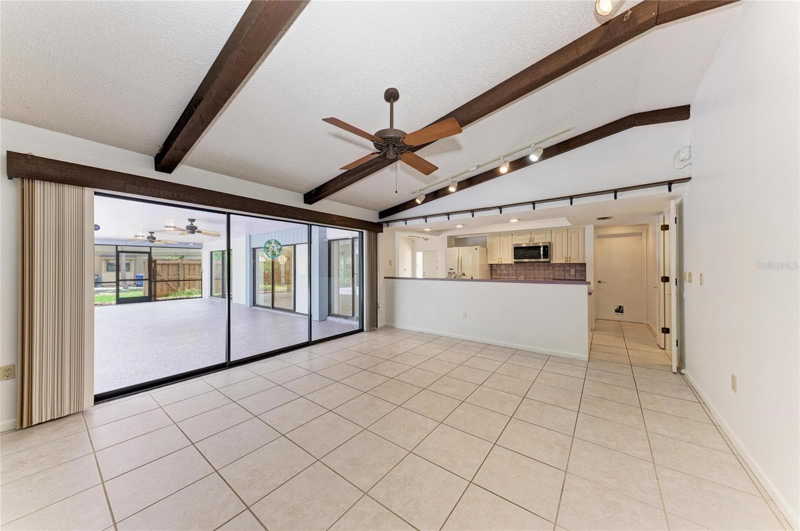 Family room and kitchen - 4242 DRYDEN CIR, SARASOTA