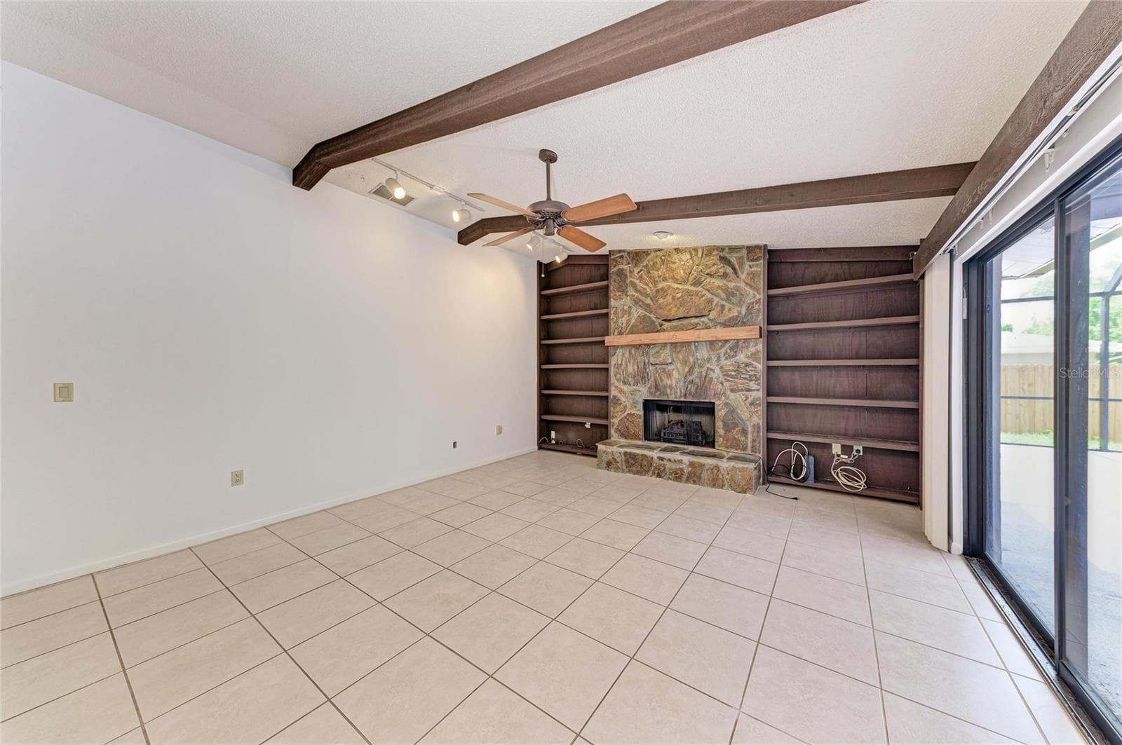 Family room with fireplace - 4242 DRYDEN CIR, SARASOTA