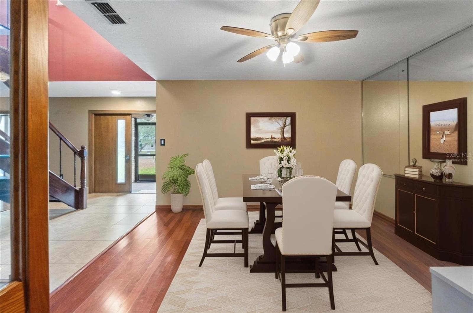 formal dining room in primaryVirtually Stagedresidence.Virtually Staged - 1357 DINSMORE CT, NEW PORT RICHEY