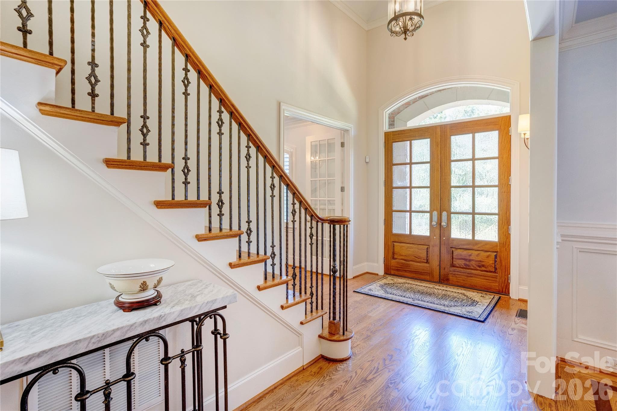 Classic staircase to the upper floor - 6005 Willowood Road, Kannapolis