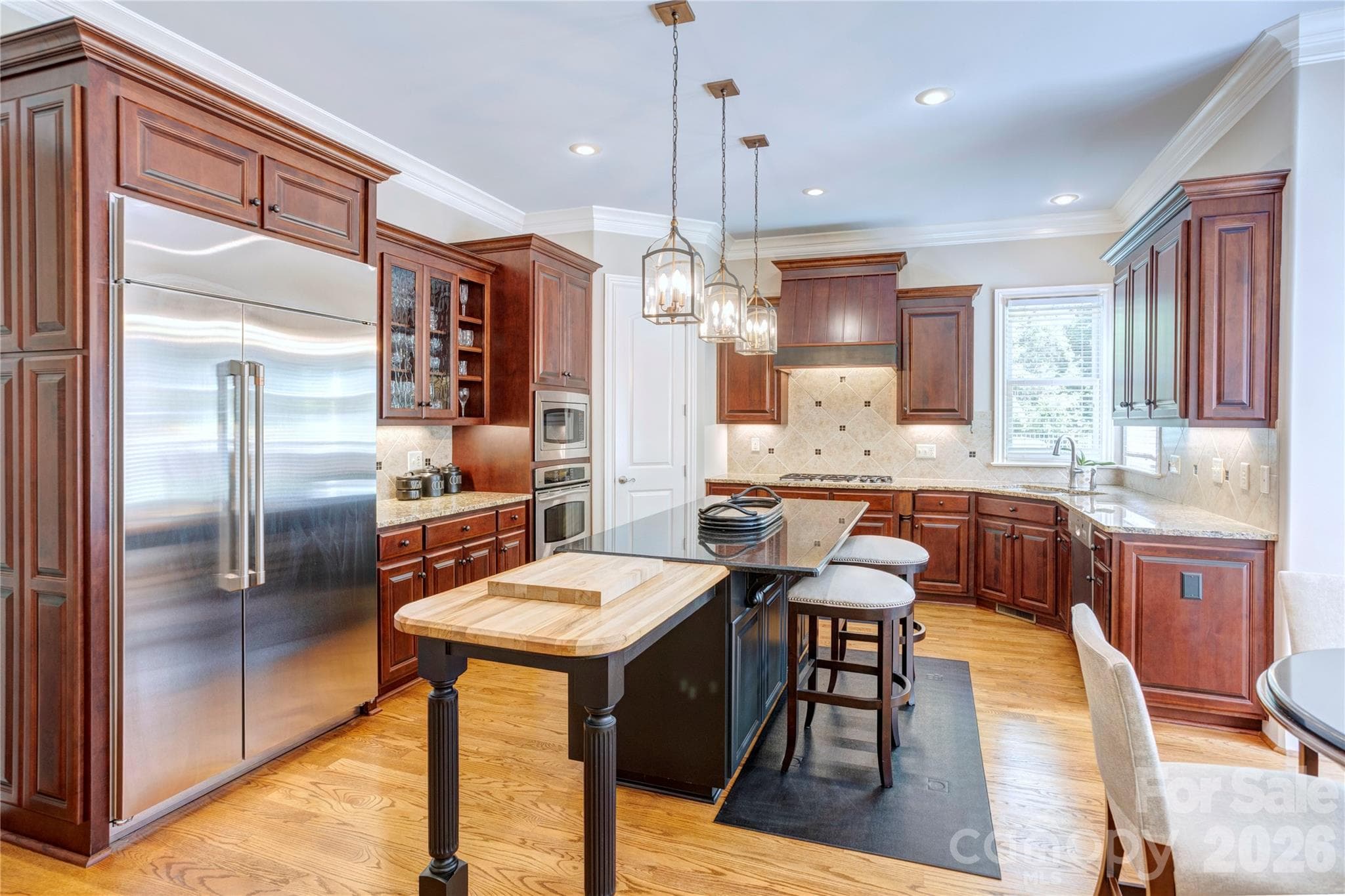 Chefs kitchen with 2025 GE Cafe Refrigerator - 6005 Willowood Road, Kannapolis