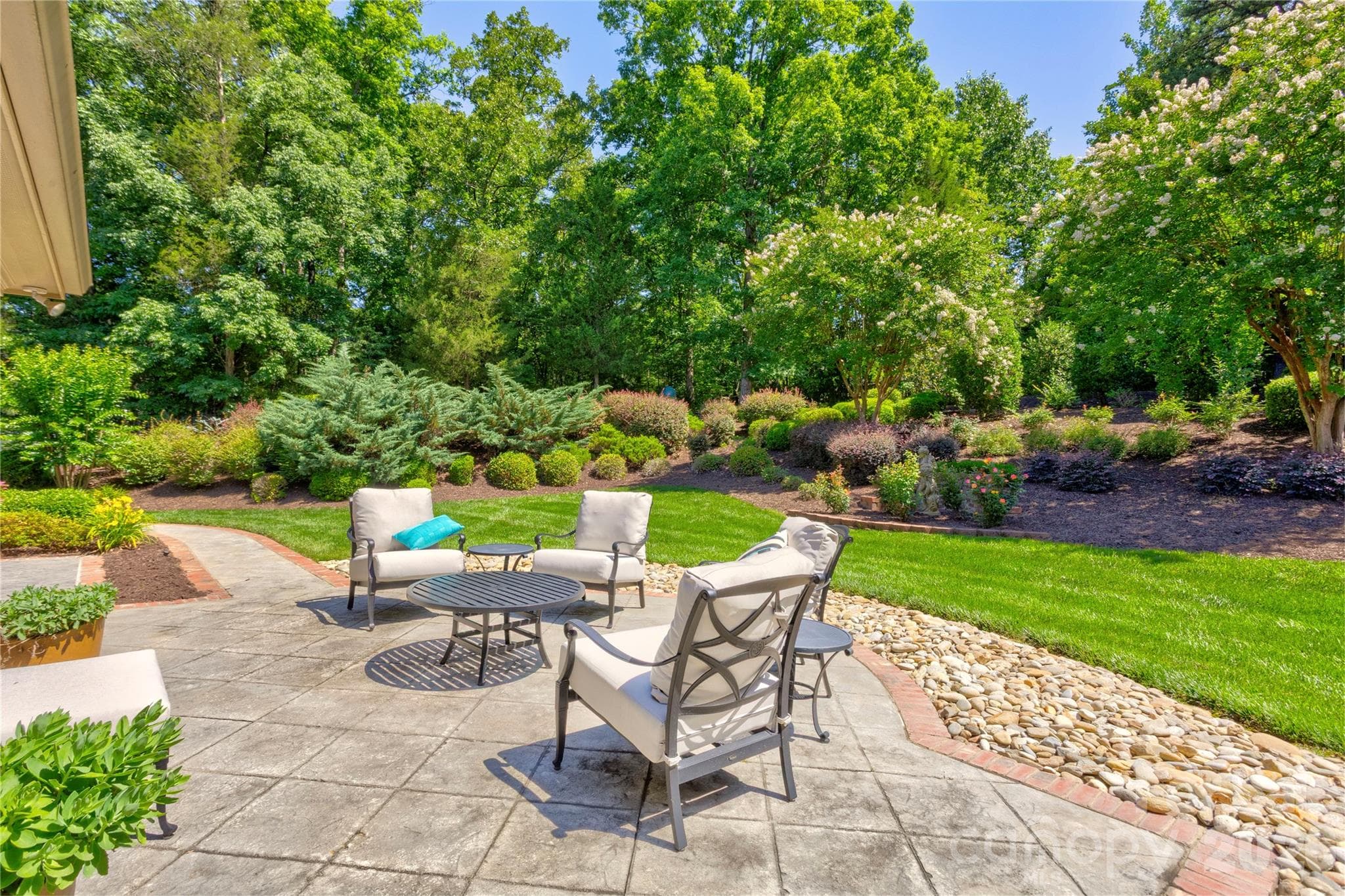 Patios just beyond the house - 6005 Willowood Road, Kannapolis