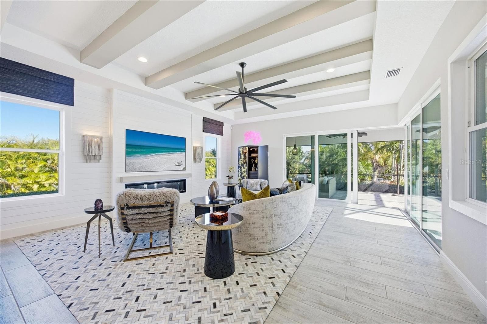 Family Room has Disappearing Corner Sliders, Beams, Shiplap, Electric Fireplace and Mantle - 3467 COMPOUND CT, SARASOTA