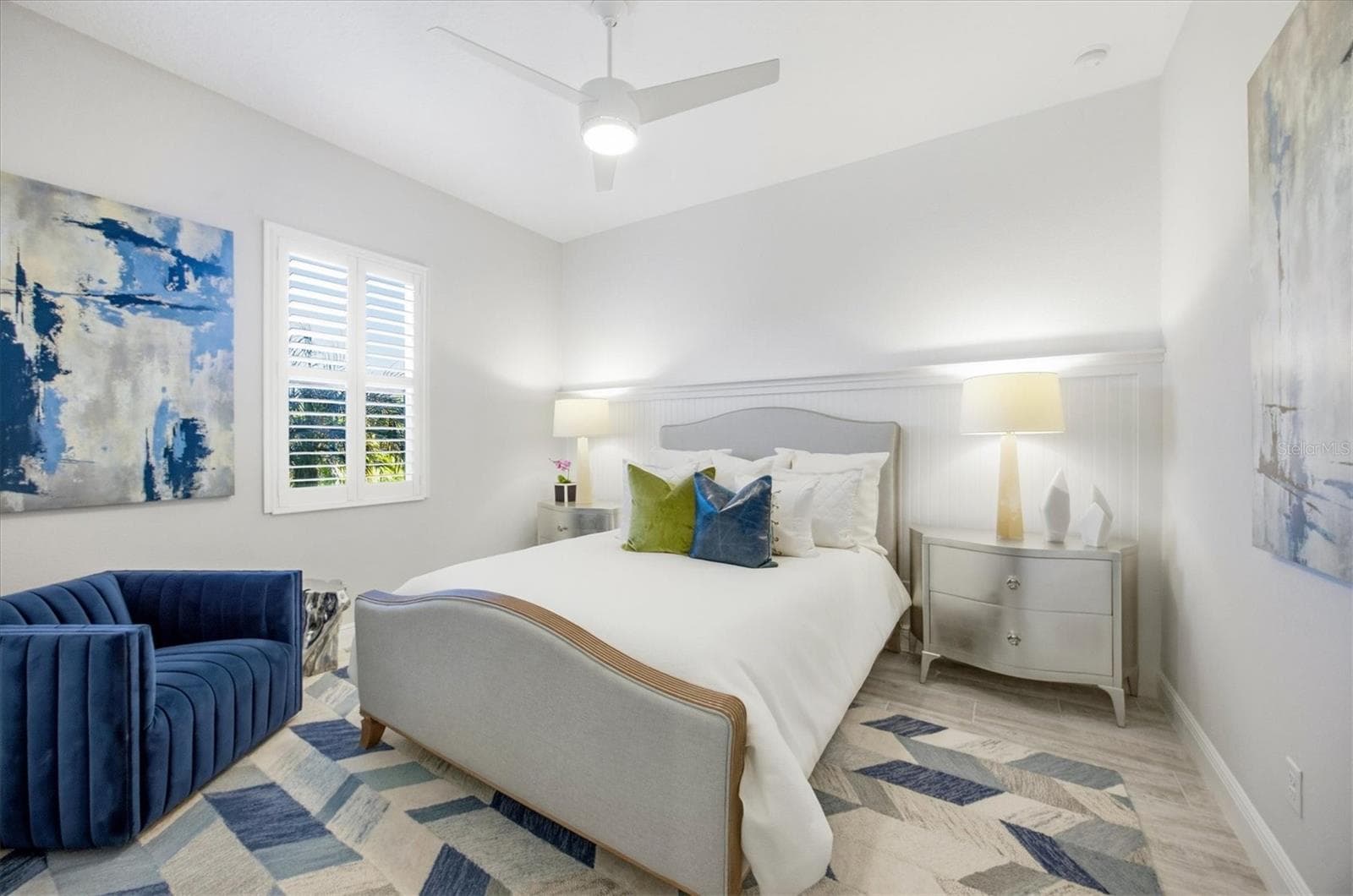 Guest Bedroom 2 has Shiplap, Plantation Shutters and Ceiling Fan - 3467 COMPOUND CT, SARASOTA
