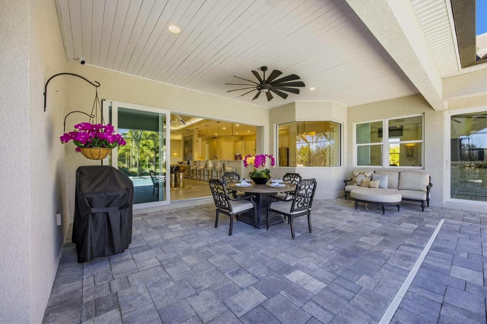 Lanai Dining Area has Pavers, Shiplap and Ceiling Fan - 3467 COMPOUND CT, SARASOTA