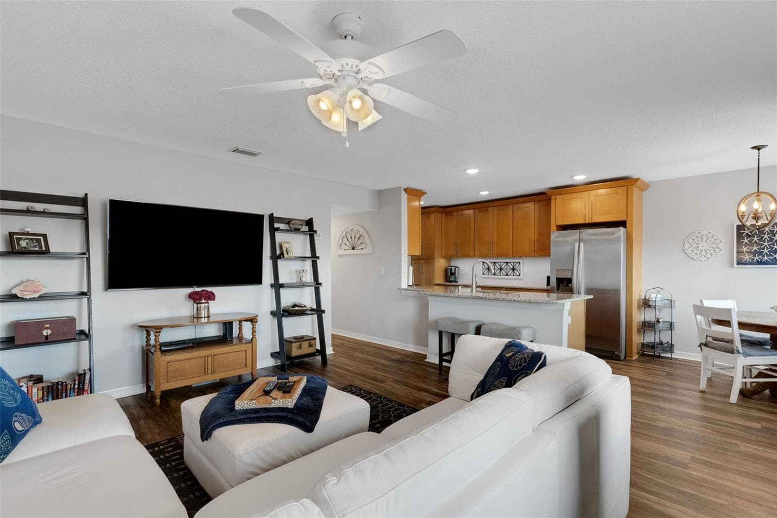 Living Room Open to Kitchen With Breakfast Bar. Dining Area to the Right - 8039 GARDEN DR #109, SEMINOLE