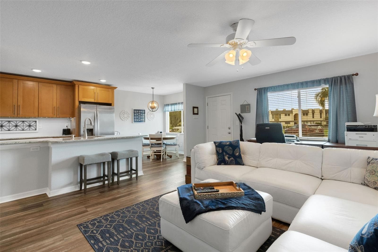 Living Room Looking to Dining Area and Kitchen - 8039 GARDEN DR #109, SEMINOLE
