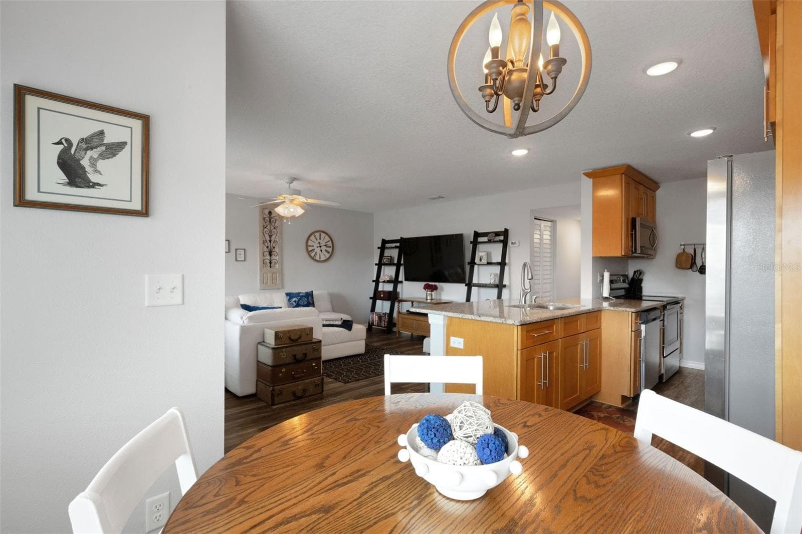 Dining Area Looking to Kitchen and Living Room - 8039 GARDEN DR #109, SEMINOLE