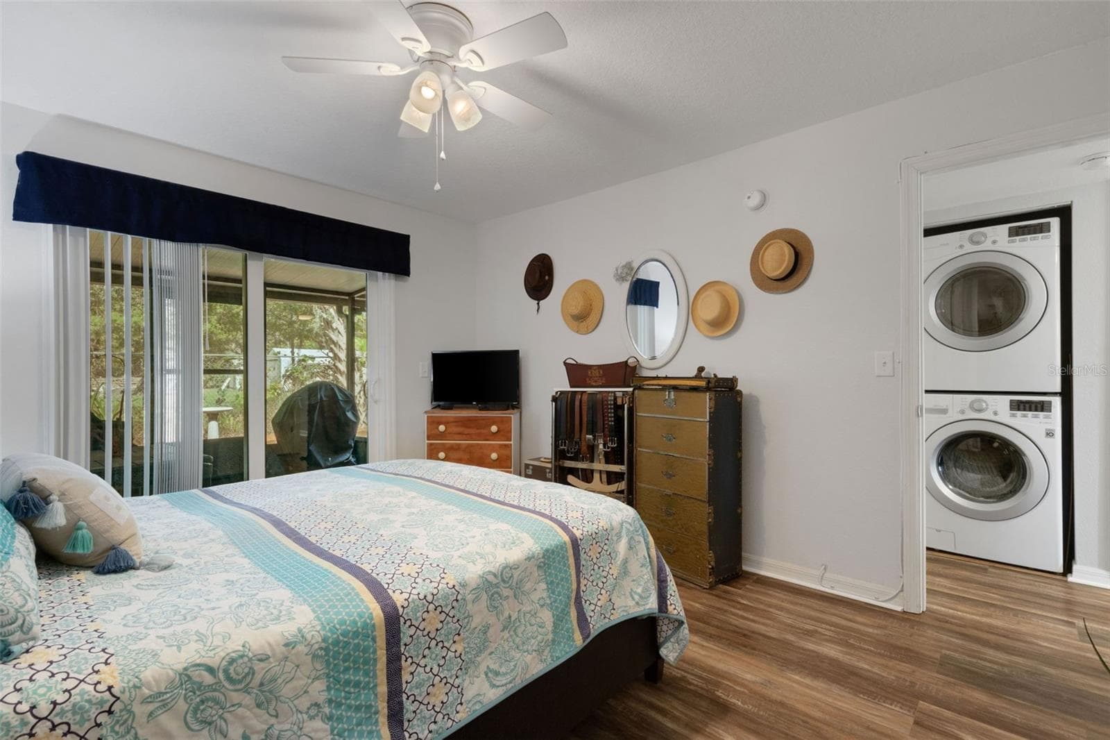 Primary Bedroom With Sliders to Screened Porch - 8039 GARDEN DR #109, SEMINOLE