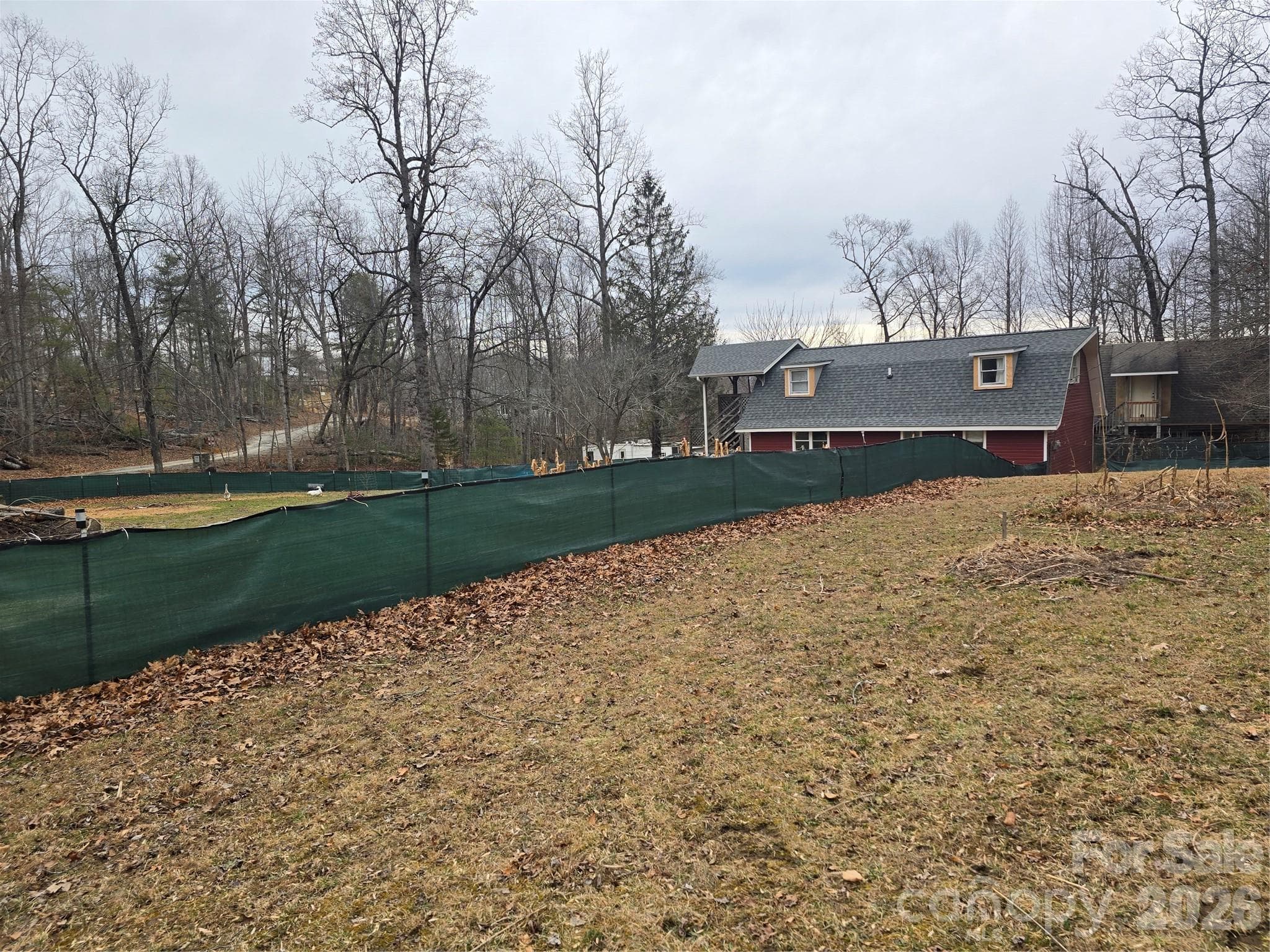 View looking at upstairs and downstairs Units from the RV pad. Rent out the space for additional income - Hendersonville