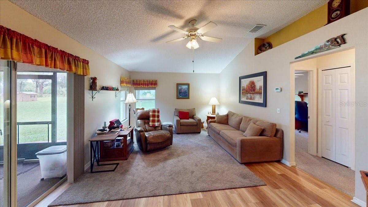 Large windows and abundant natural light Family Room/ sitting area. - 267 N ORANGE AVE, LAKE HELEN