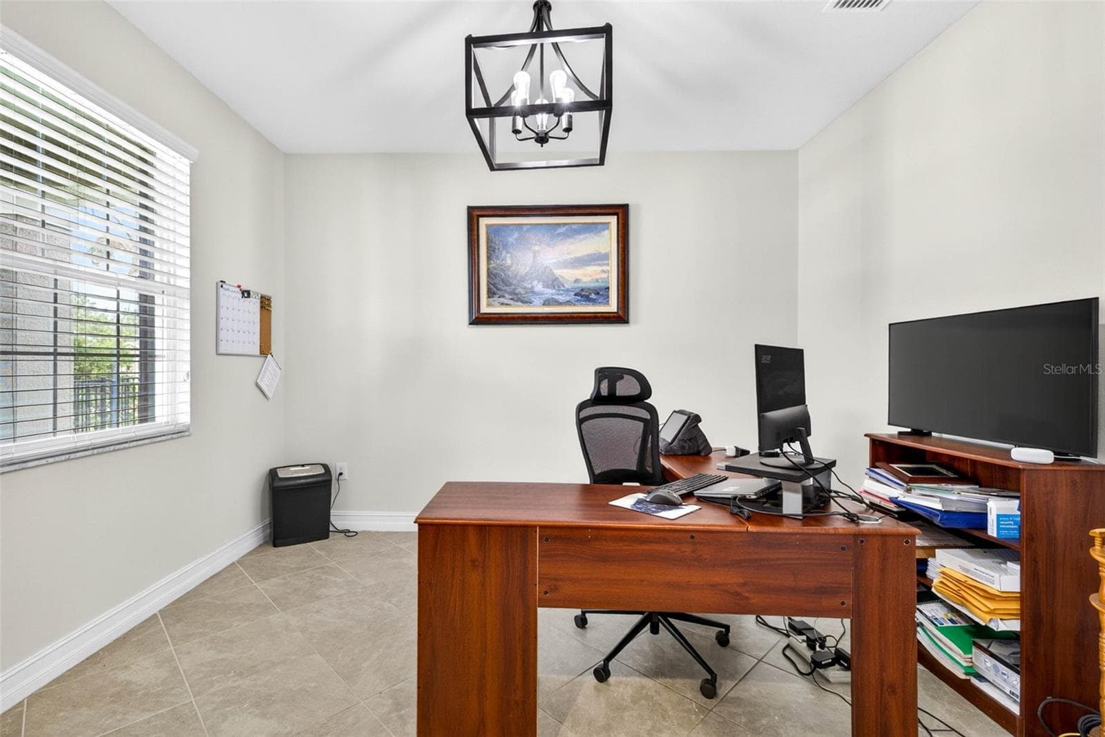 First floor office by the entryway.  Doors added for privacy. - 7109 BAY LAUREL CT, WESLEY CHAPEL