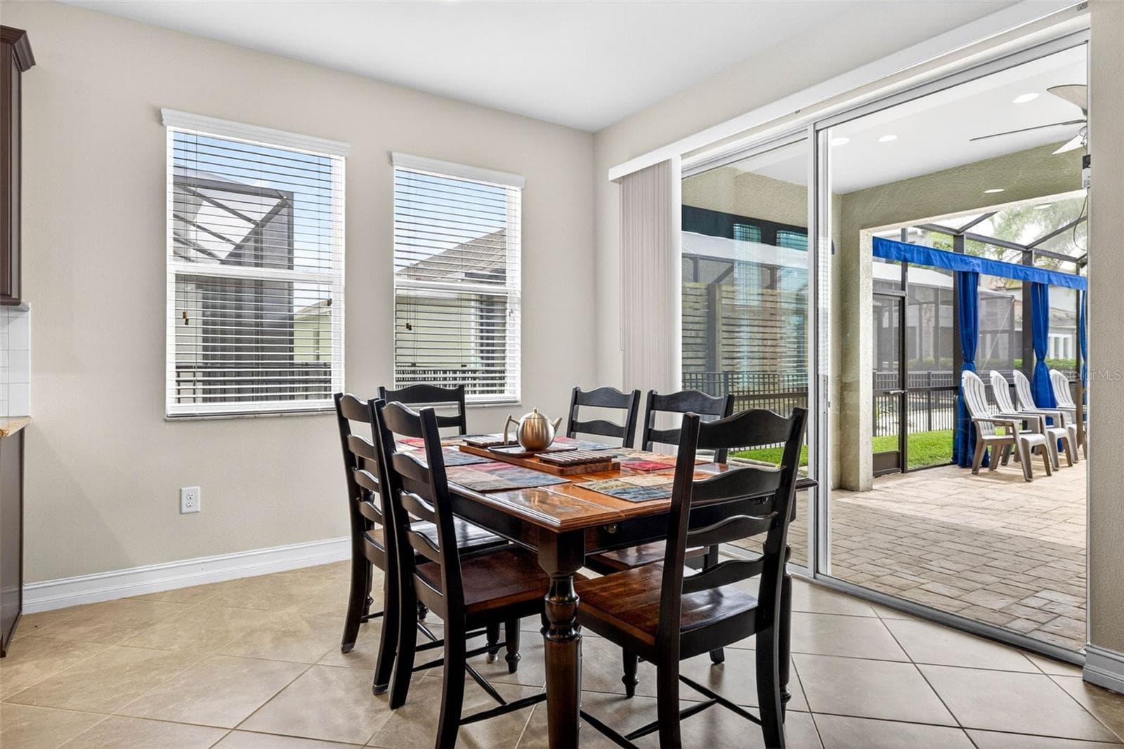 Dining area comfortably sits up to 8-10 - 7109 BAY LAUREL CT, WESLEY CHAPEL