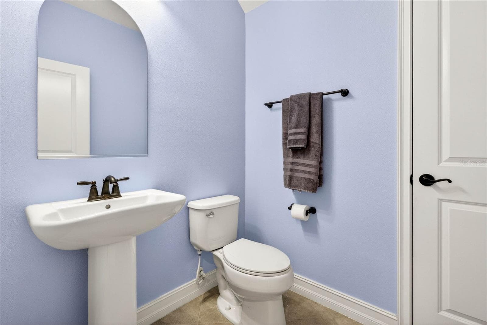 First floor half bath. - 7109 BAY LAUREL CT, WESLEY CHAPEL