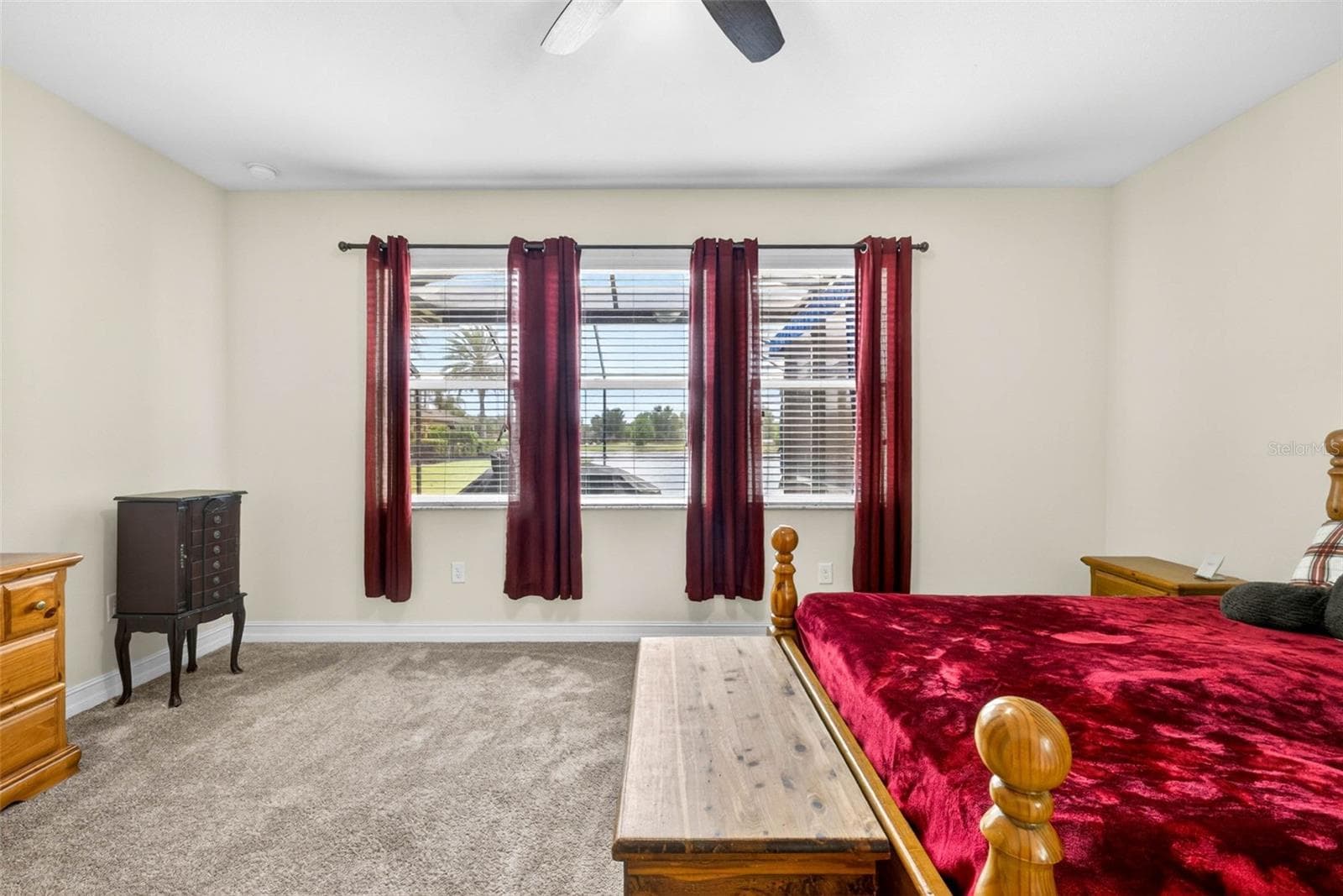 Views of the pool and pond from your primary suite - 7109 BAY LAUREL CT, WESLEY CHAPEL