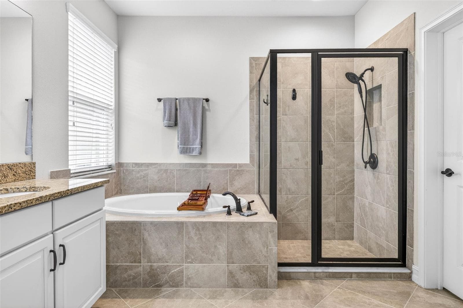 Soaking tub AND shower. - 7109 BAY LAUREL CT, WESLEY CHAPEL