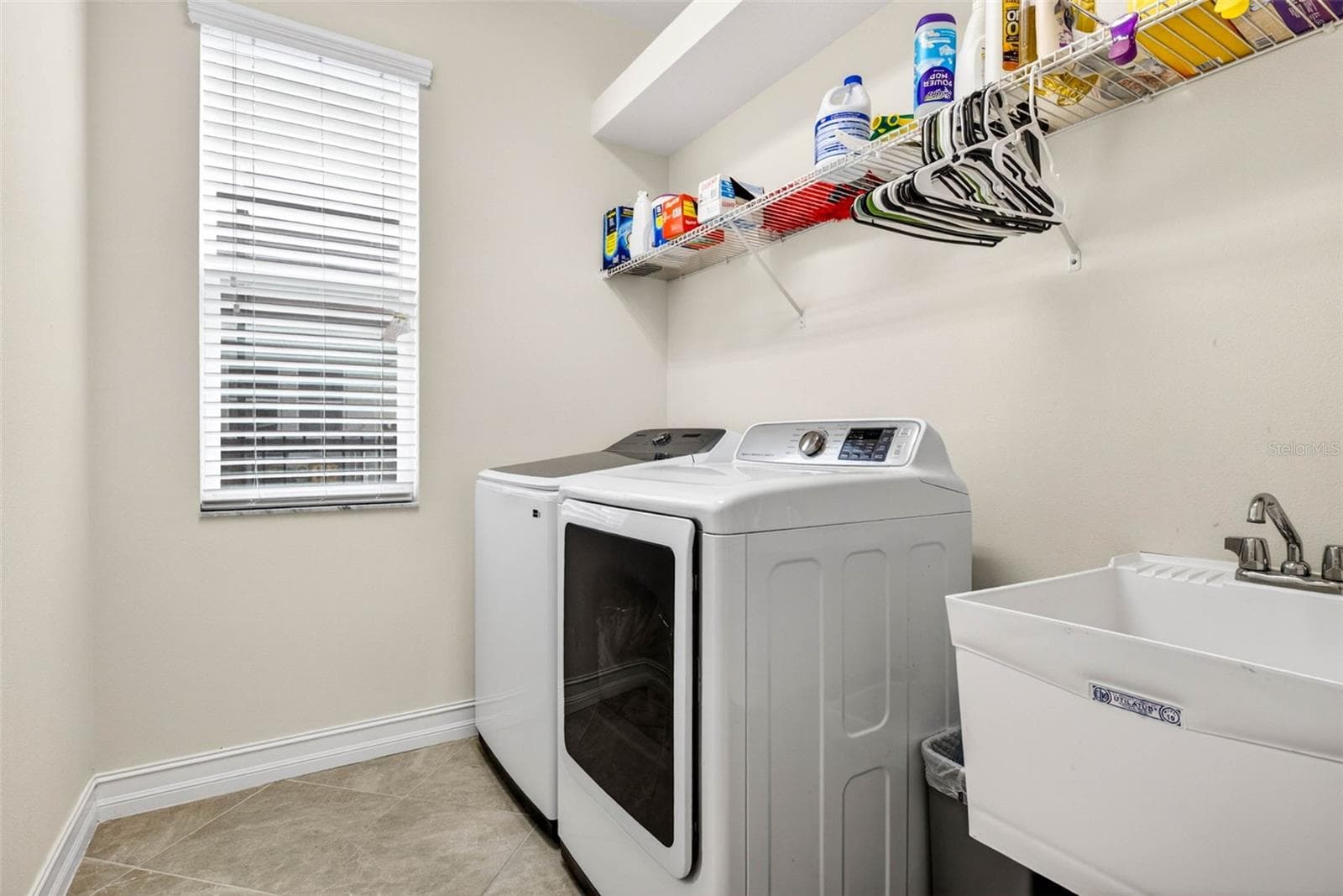 First floor laundry room. - 7109 BAY LAUREL CT, WESLEY CHAPEL