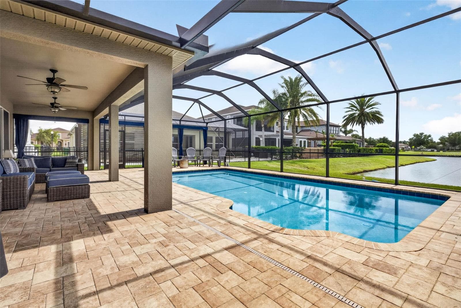 Pool is salt water, heated, fully caged in. - 7109 BAY LAUREL CT, WESLEY CHAPEL