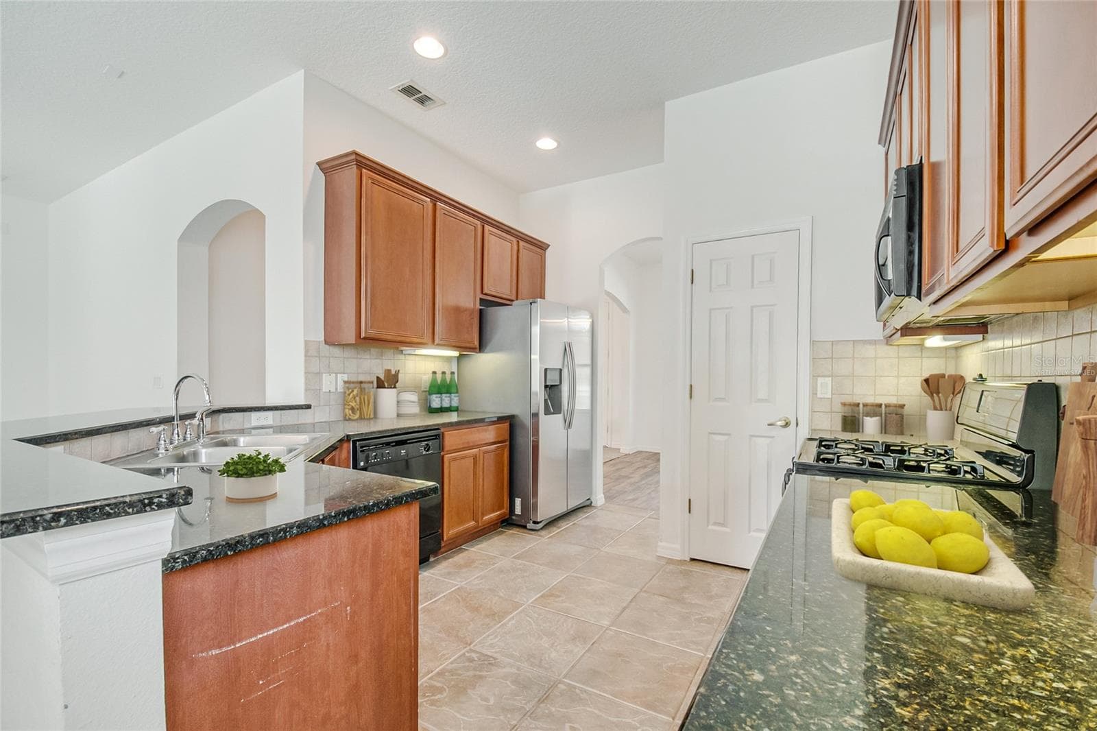 *Some marketing images have been AI-assisted and virtually staged to illustrate the property’s potential layout, design, use of space, and possible aesthetic enhancements. Certain photos may include digitally enhanced visualization of furnishings, décor, finishes, landscaping, or cosmetic elements for marketing and illustrative purposes only. Actual property conditions, features, finishes, fixtures, and appearance may vary, and buyers are encouraged to independently inspect the property to verify all present conditions.* - 7407 DEVEREAUX ST, REUNION