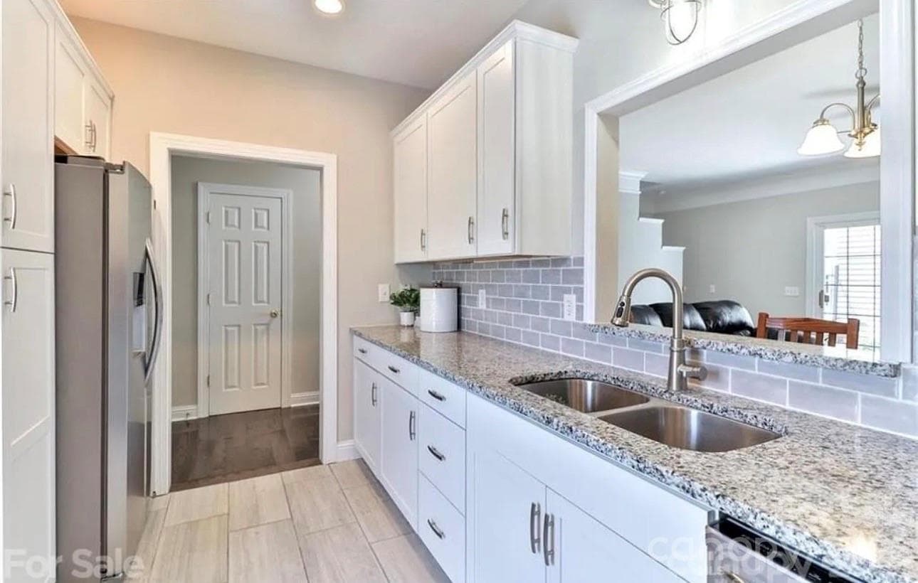 Kitchen showcasing granite countertops - 6918 Misty Pine Lane, Charlotte