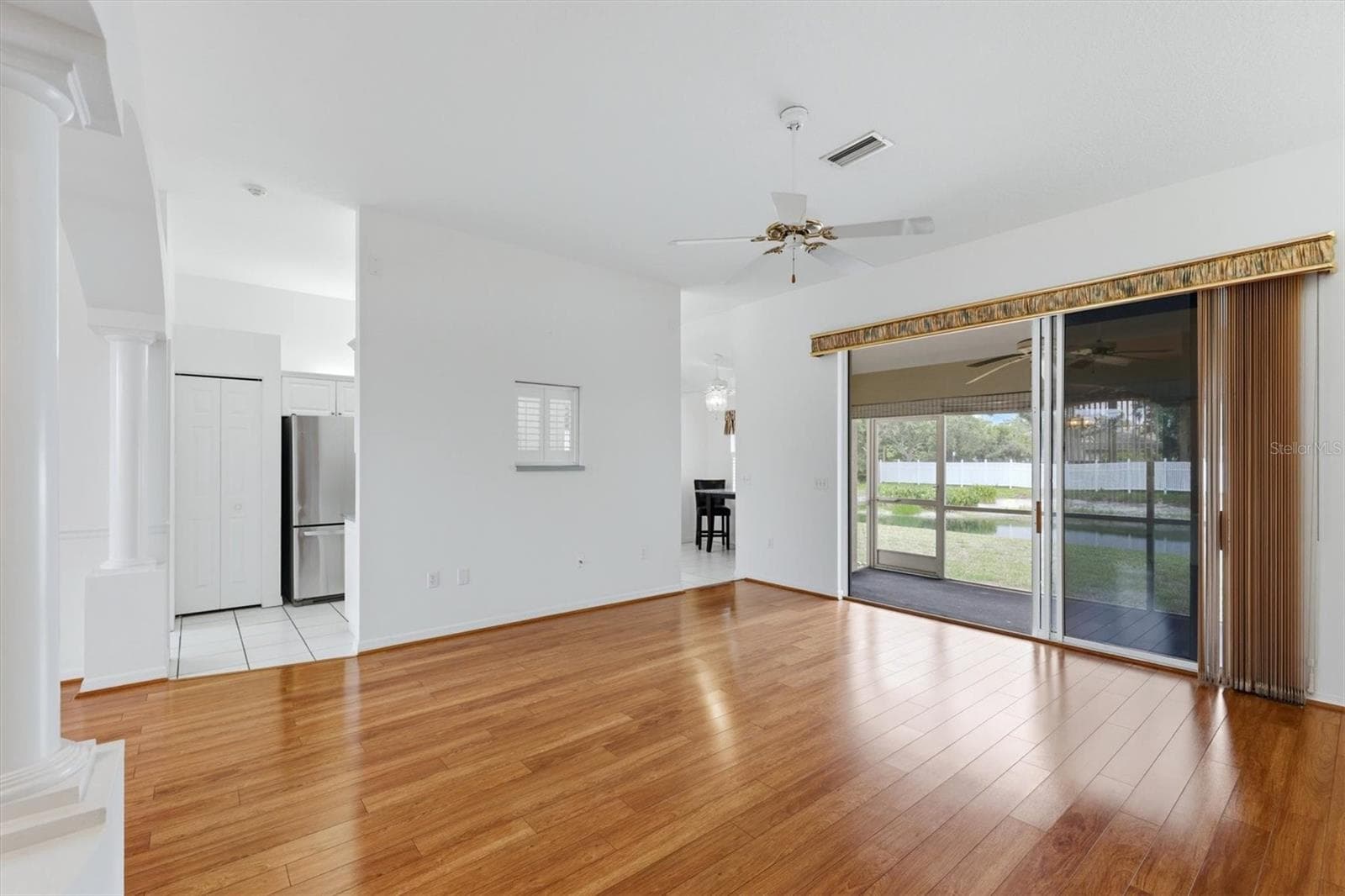 Living room with sliders to the lanai - 2404 50TH DR E, BRADENTON