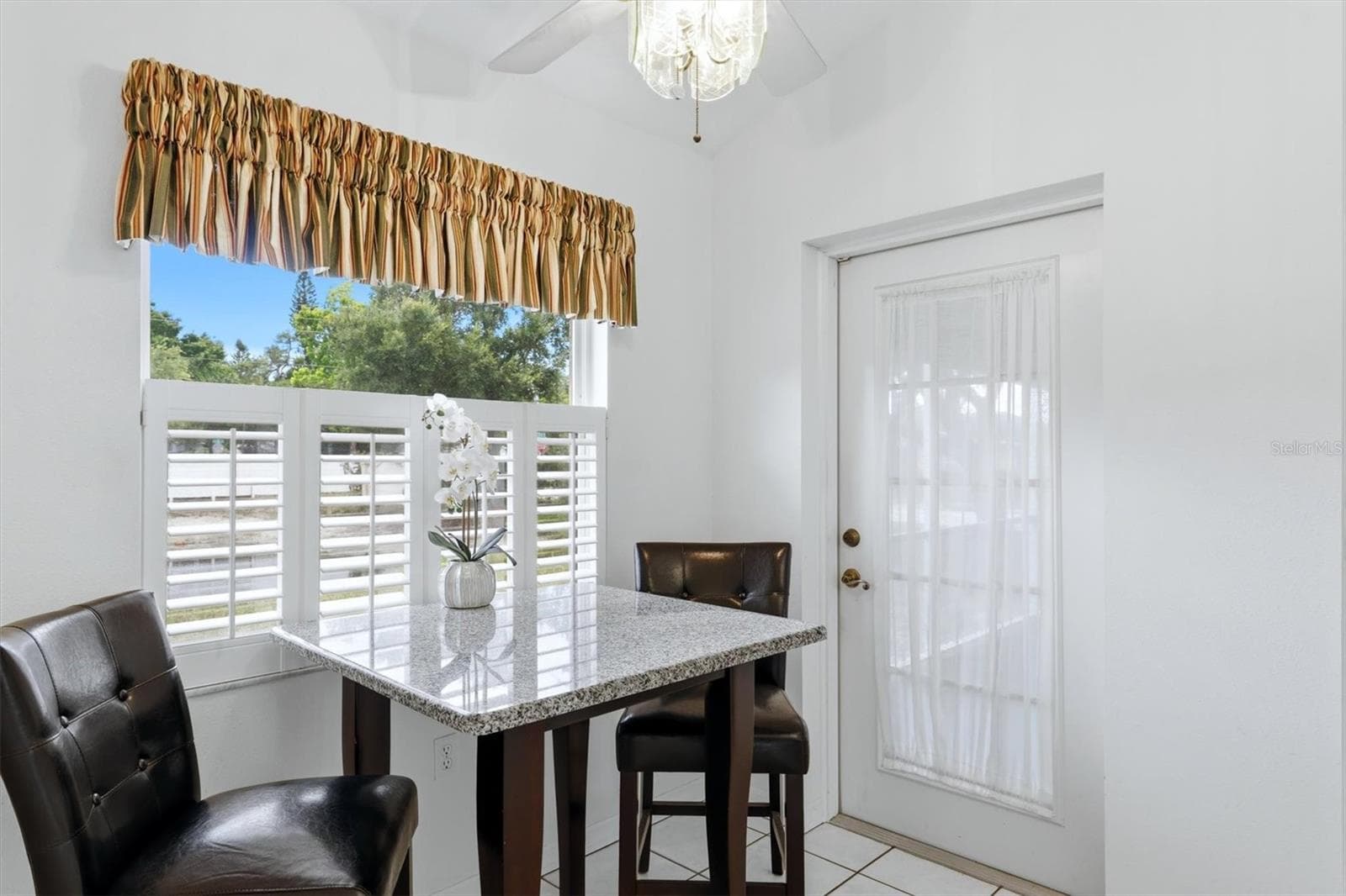 Breakfast nook with French door to lanai - 2404 50TH DR E, BRADENTON