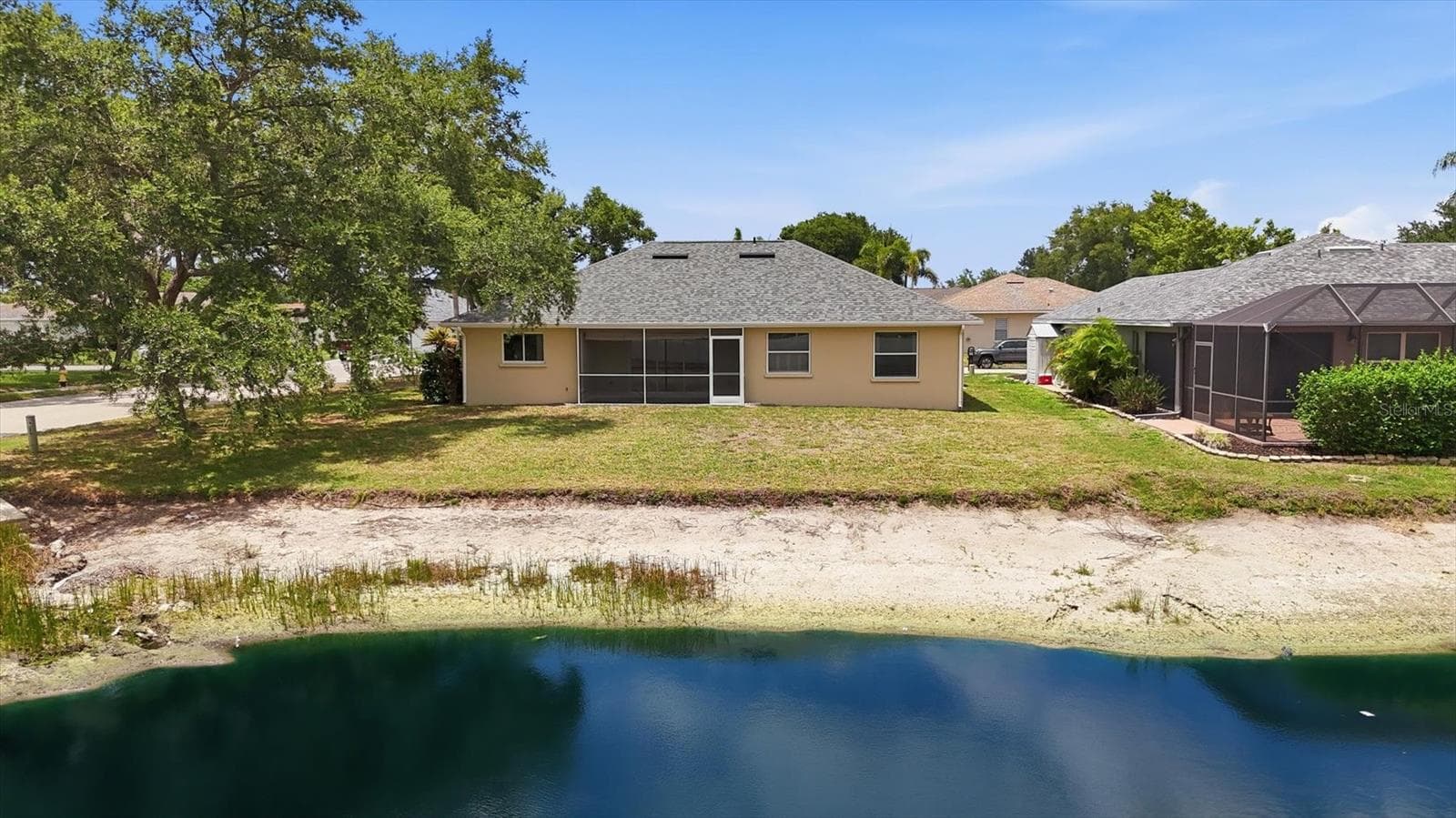 Backyard view - 2404 50TH DR E, BRADENTON