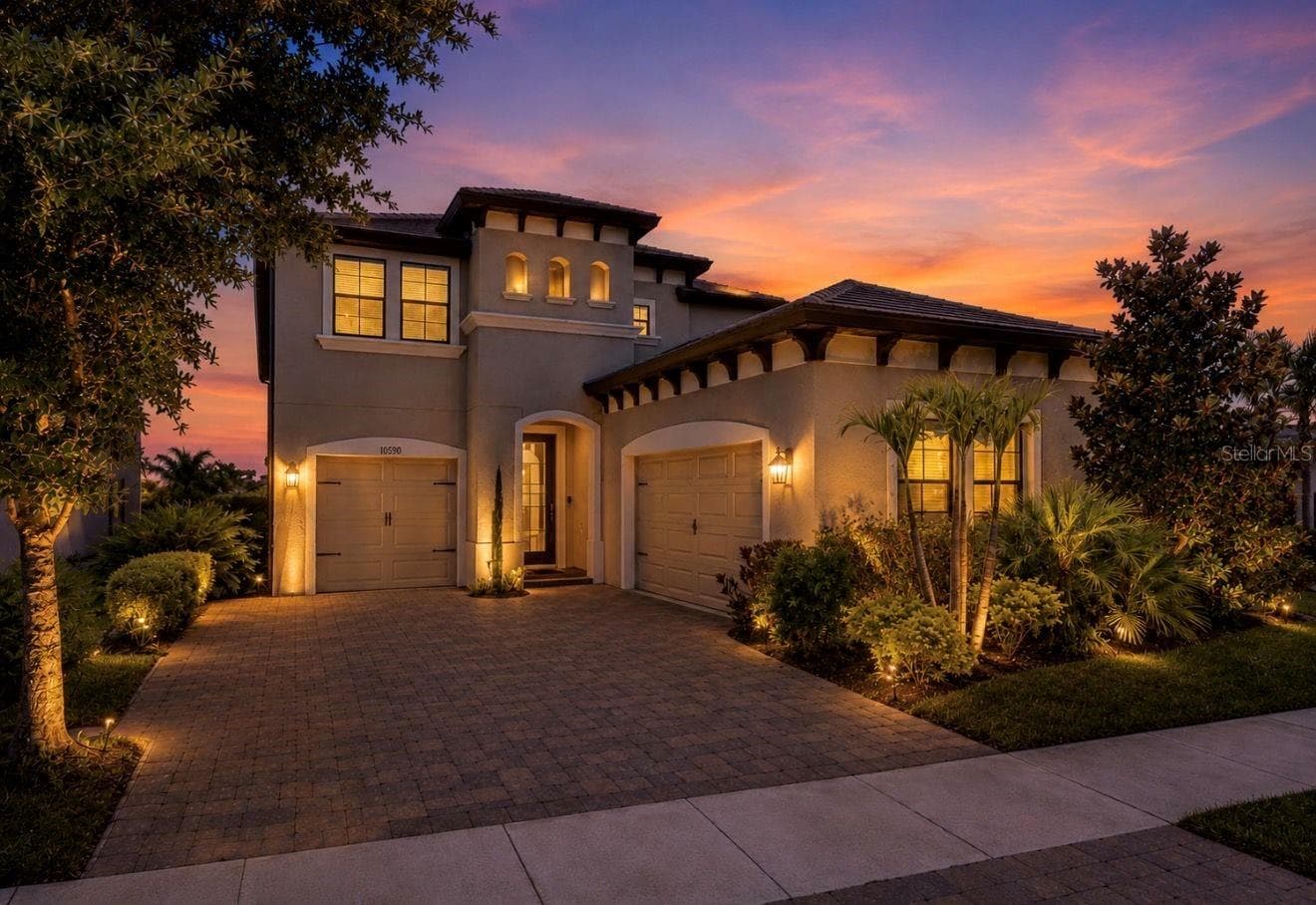 Twilight photo front of home - 13107 MONACH ISLES DR, RIVERVIEW