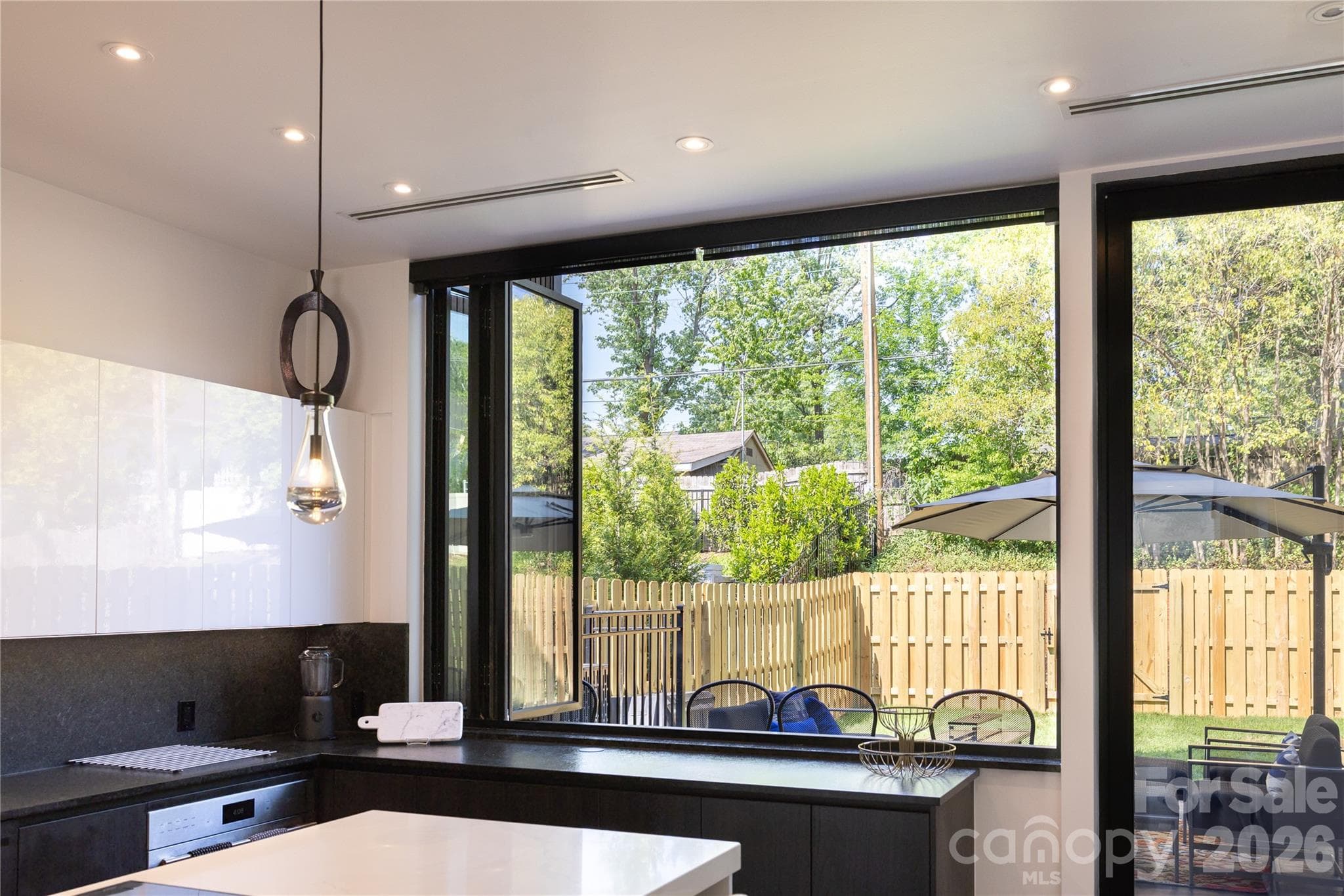Open to the backyard for entertaining - Charlotte