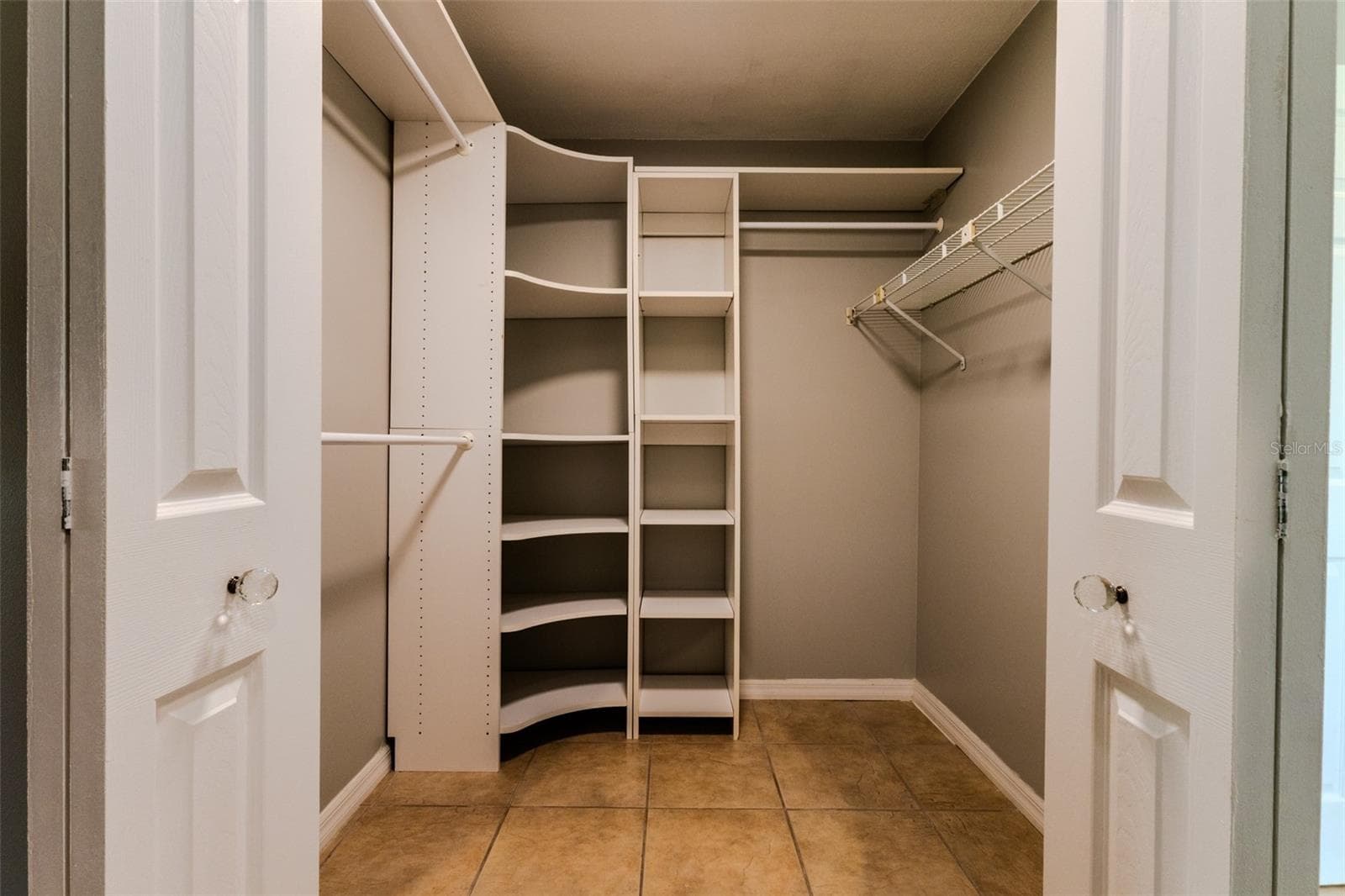 Primary closet with built-ins - 1861 CROWLEY CIR E, LONGWOOD
