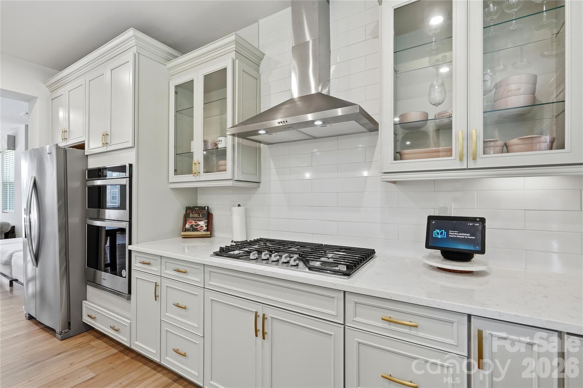 Stainless range hood and gas cooktop perfect for cooking up your favorite meals! - 3324 Treble Court, Charlotte