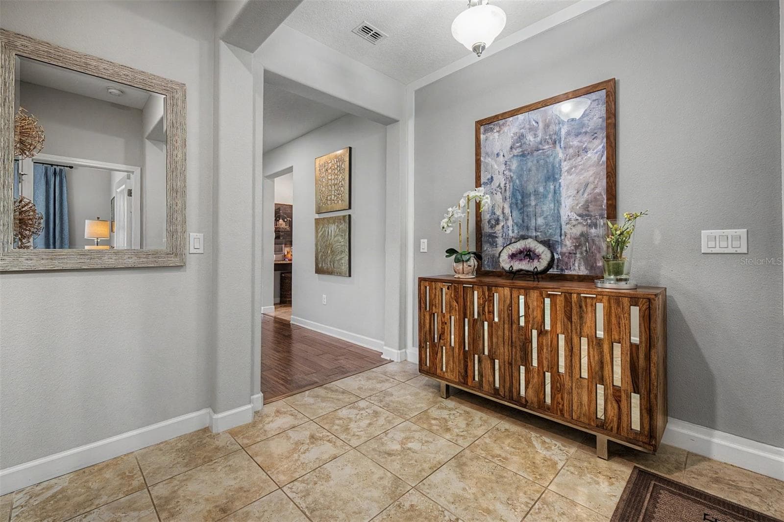 Foyer welcomes you in with framed accent wall! - 4926 SOUTHERN VALLEY LOOP, BROOKSVILLE