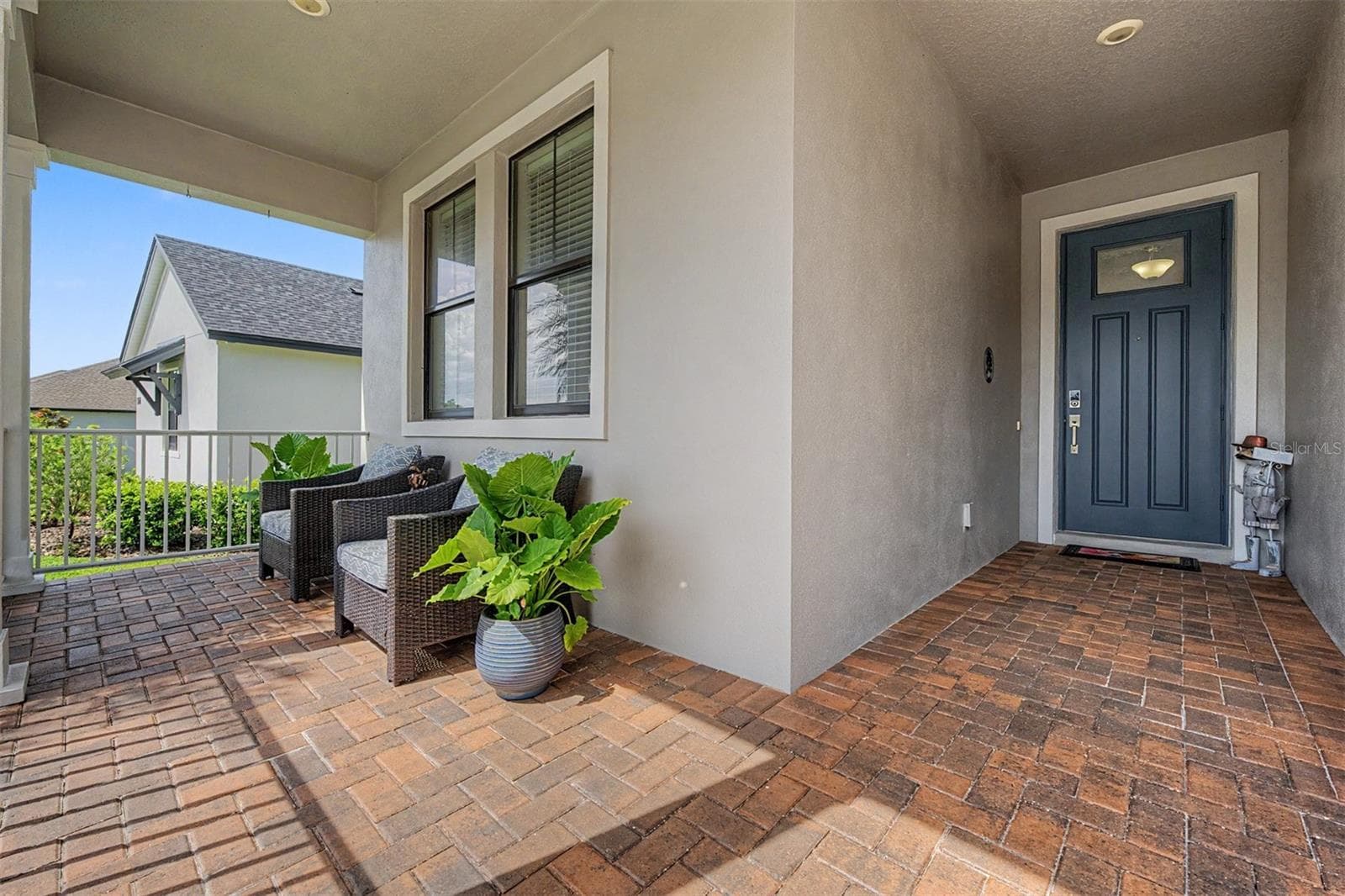 Inviting brick paver, covered front porch! - 4926 SOUTHERN VALLEY LOOP, BROOKSVILLE