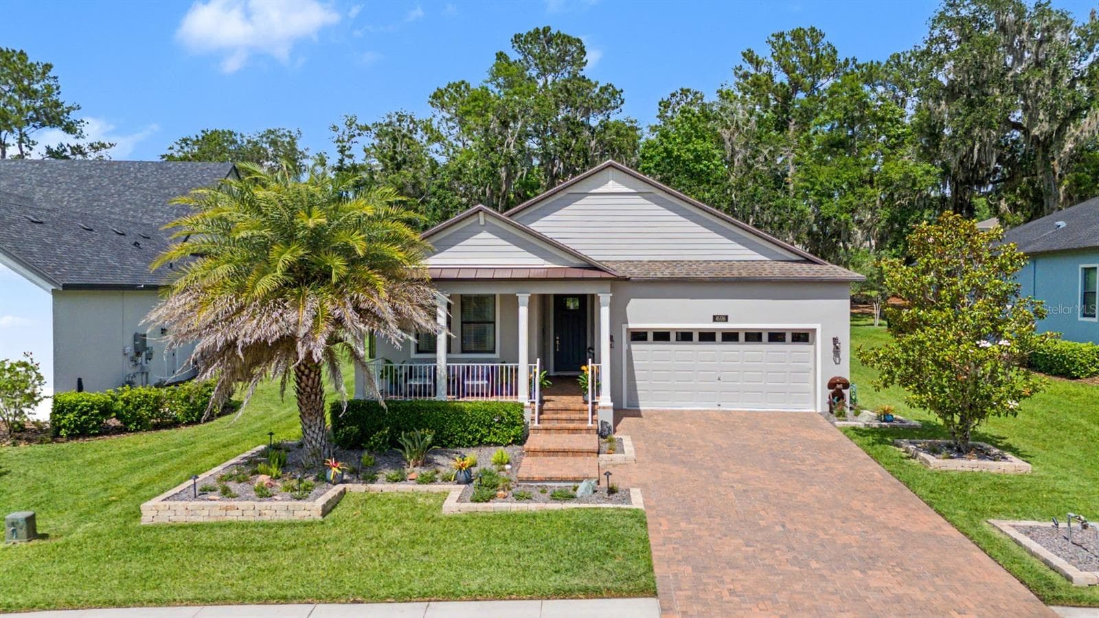 Covered front porch awaits! - 4926 SOUTHERN VALLEY LOOP, BROOKSVILLE