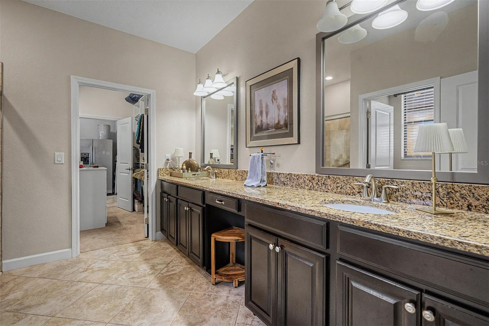 Primary bathroom with dual sinks, vanity area and large shower - 4926 SOUTHERN VALLEY LOOP, BROOKSVILLE