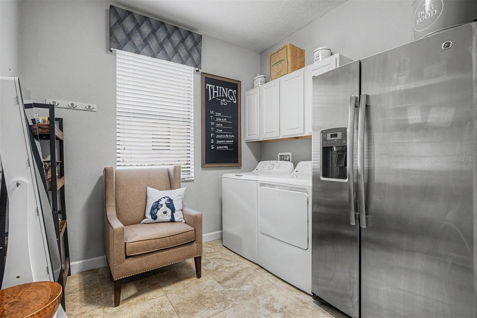 Laundry room with extra refrigerator and storage. - 4926 SOUTHERN VALLEY LOOP, BROOKSVILLE