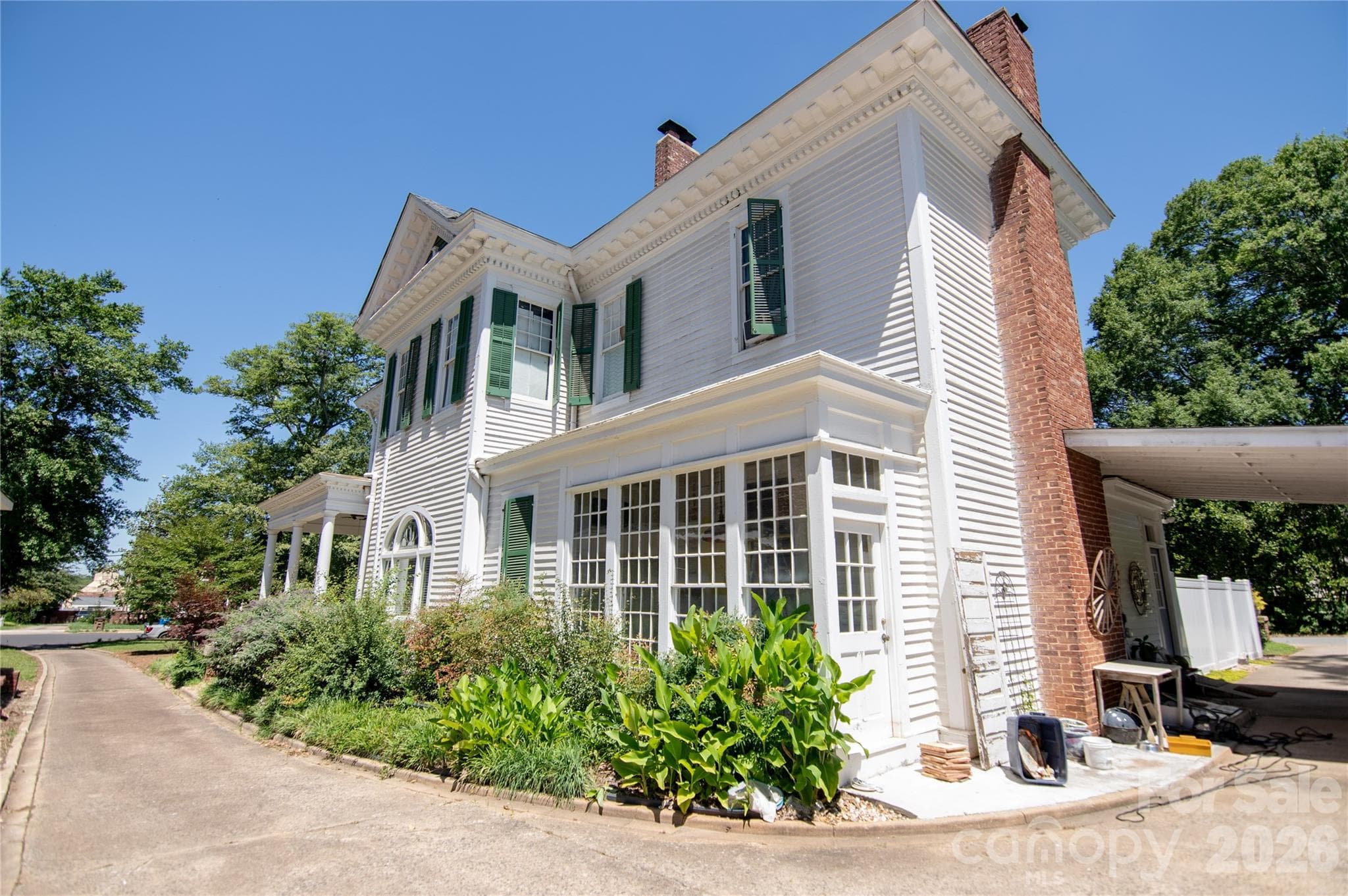 Right Rear View showing enclosed garden porch. - Shelby