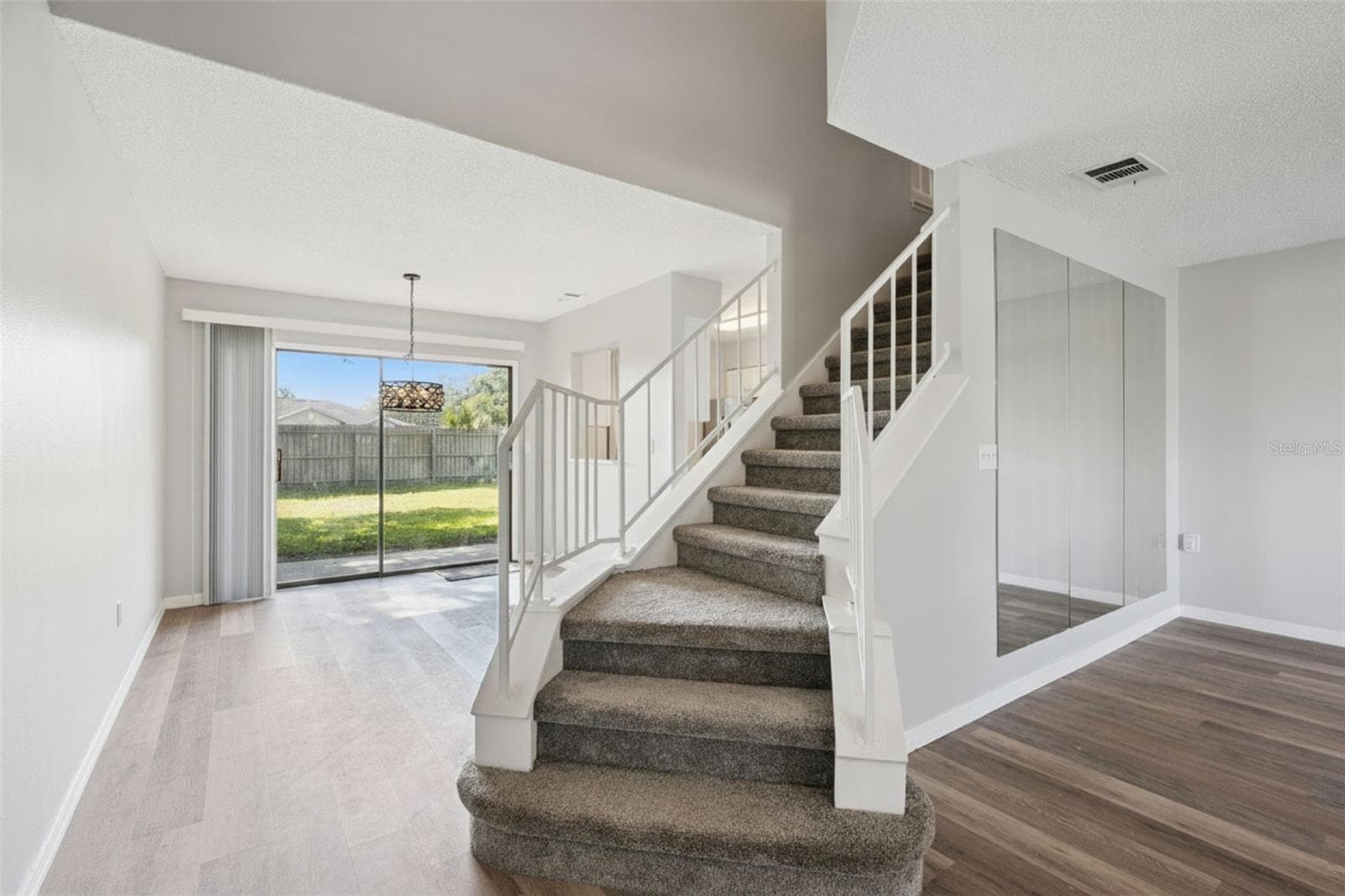 Stairs and Dining Room - 2889 WAREHAM CT, CASSELBERRY
