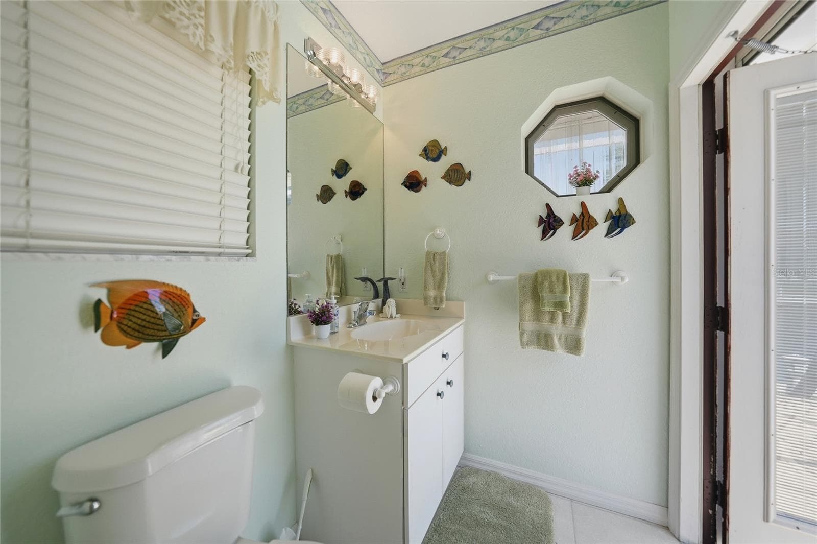 Pool Access through half bath inside Guest Bedroom 2 - 436 VALLETTA CT, PUNTA GORDA