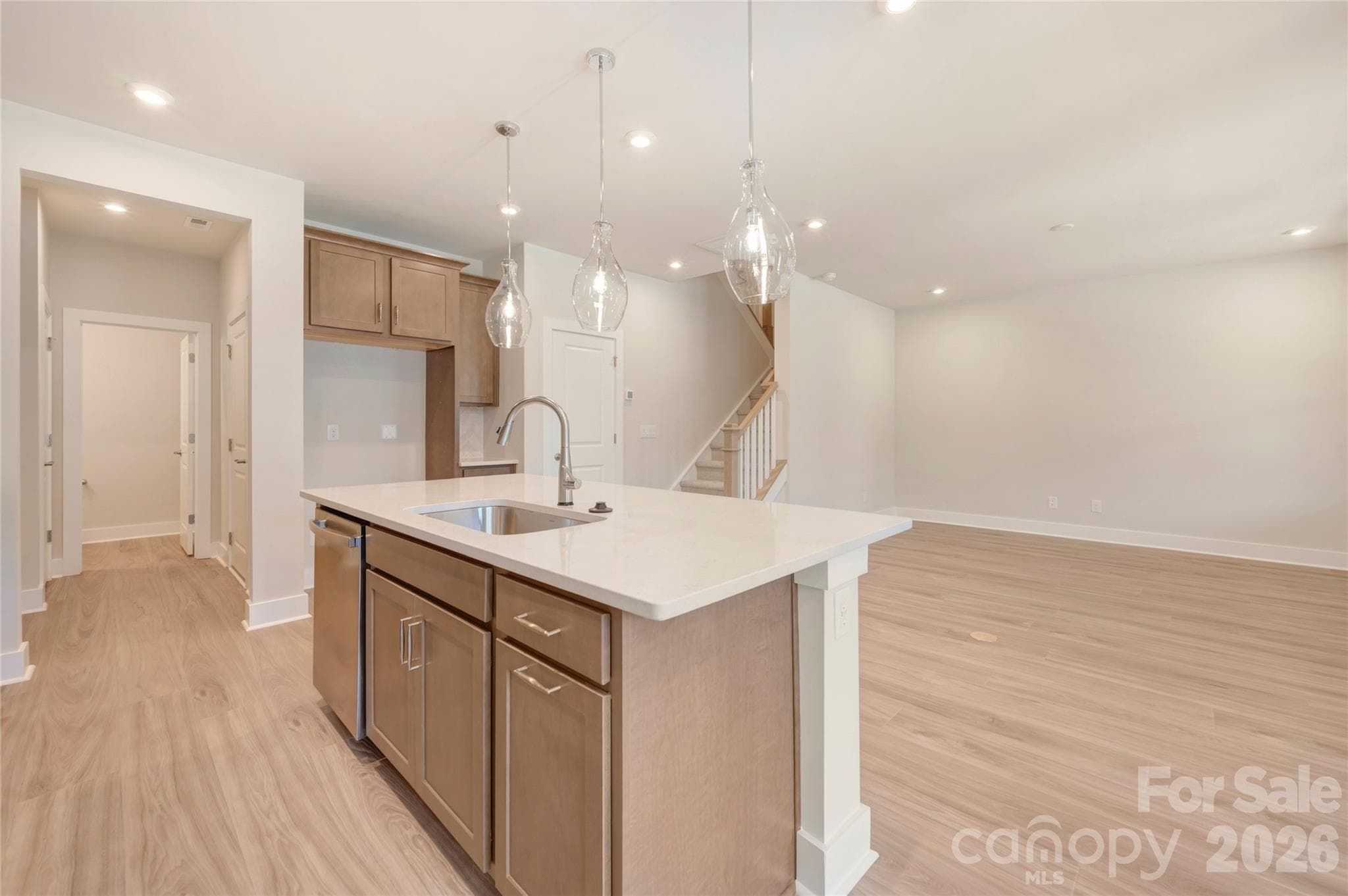Kitchen island with storage and large single bowl stainless steel sink - 316 Ardmore Drive, Belmont