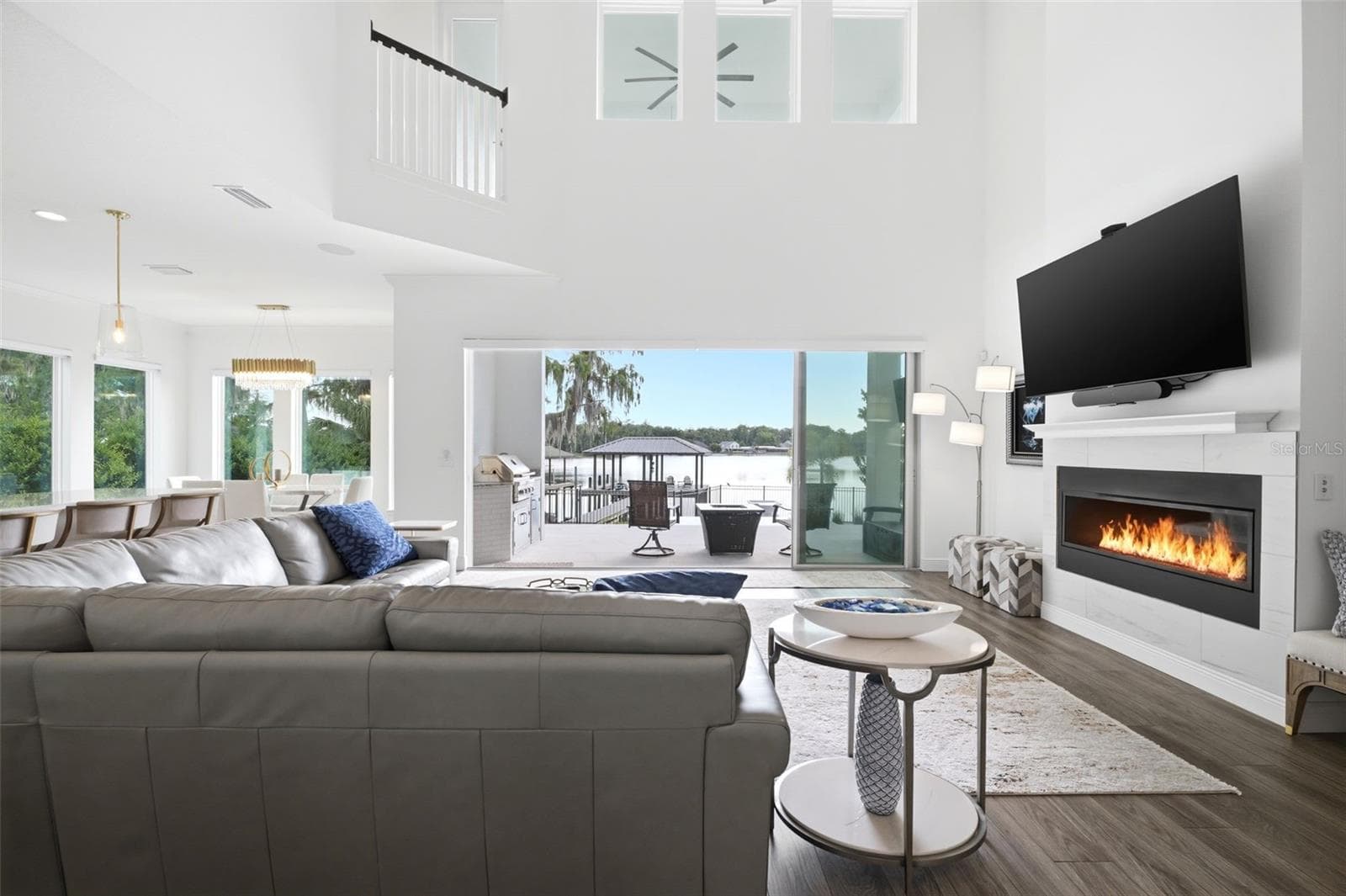 sliding glass doors open to the outdoor space - 17104 CRAWLEY RD, ODESSA