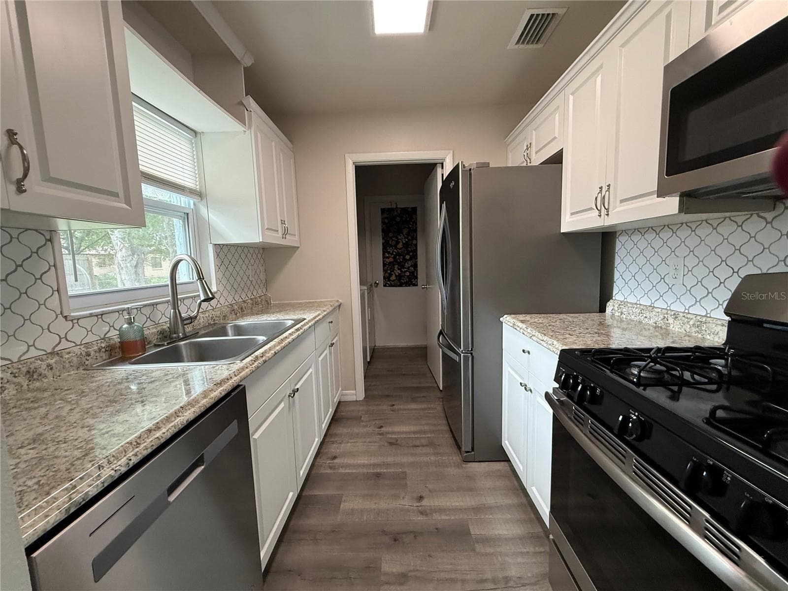 GALLEY KITCHEN UTILITY ROOM - 9129 SEWELL LN, SPRING HILL