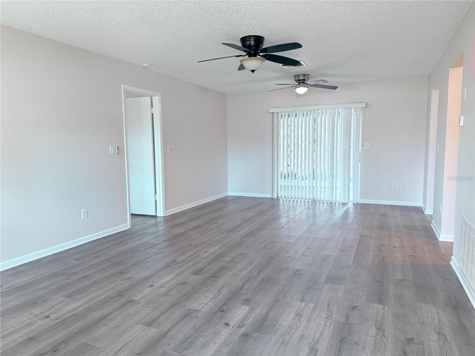Livingroom LVP flooring through the house - 9129 SEWELL LN, SPRING HILL