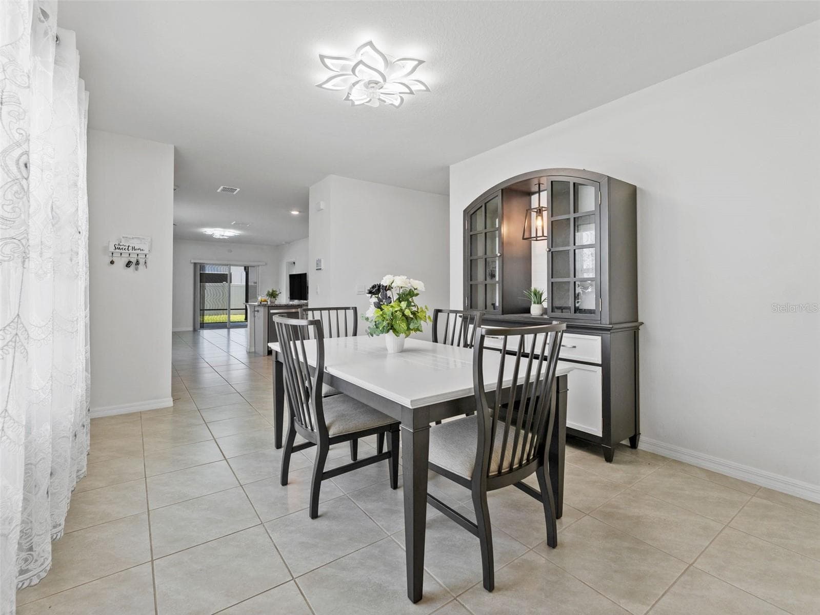 Dining room as soon as you enter the home. - 5782 HOLLINGWORTH TRL, WESLEY CHAPEL